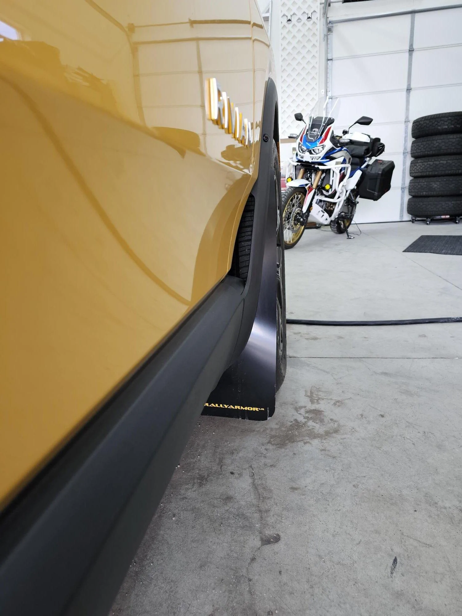 Rivian R1T R1S Rally Armor Mud flaps installed Rally Armor Pass Side Frt