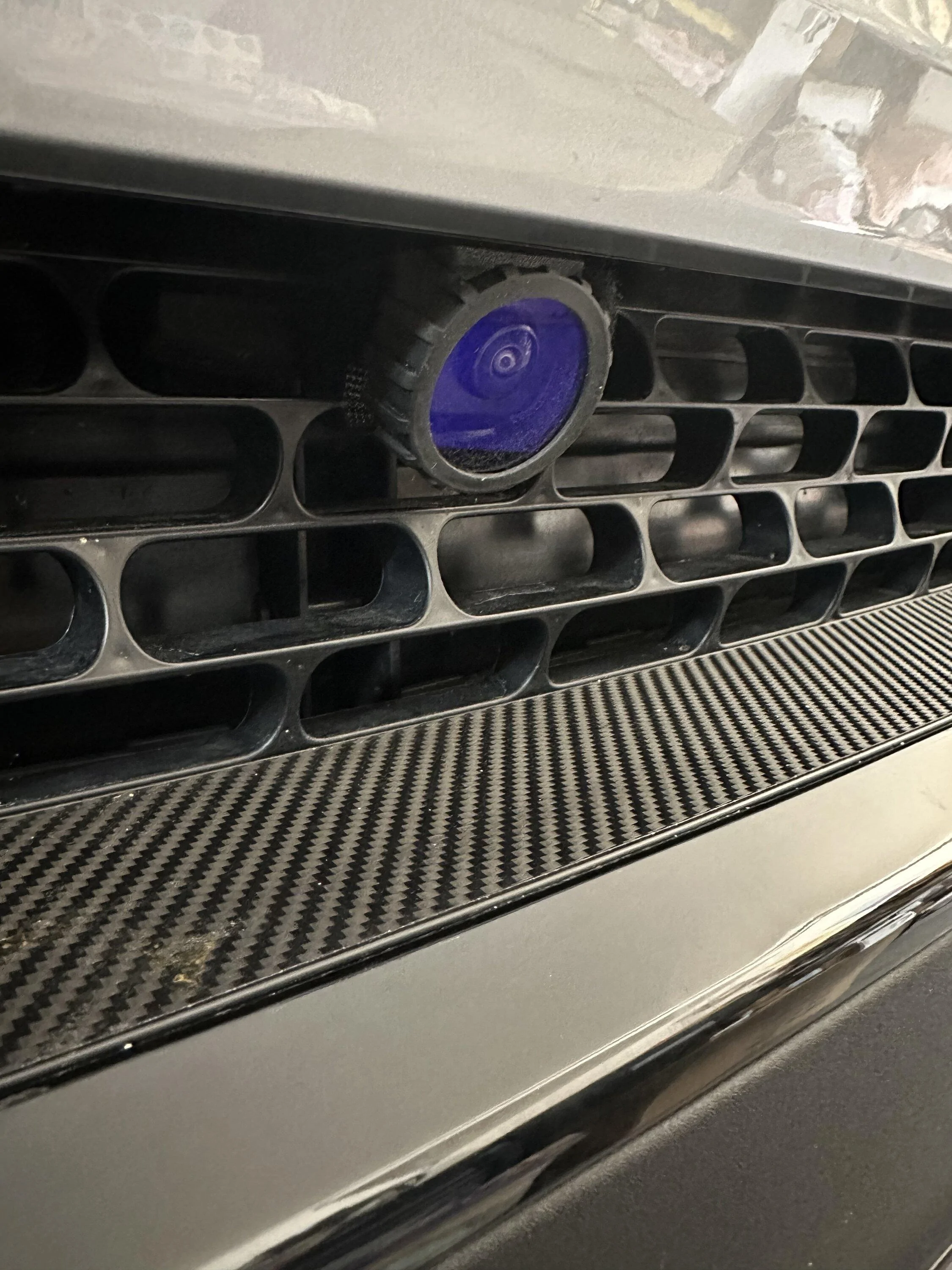 Rivian R1T R1S Rock chip on front bumper camera IMG_1117
