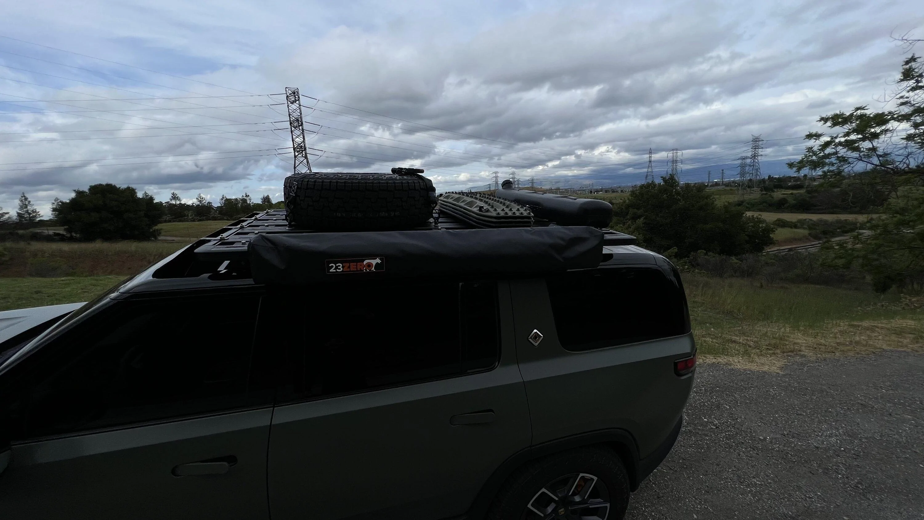 Rivian R1T R1S Full size spare on cross bars IMG_3112