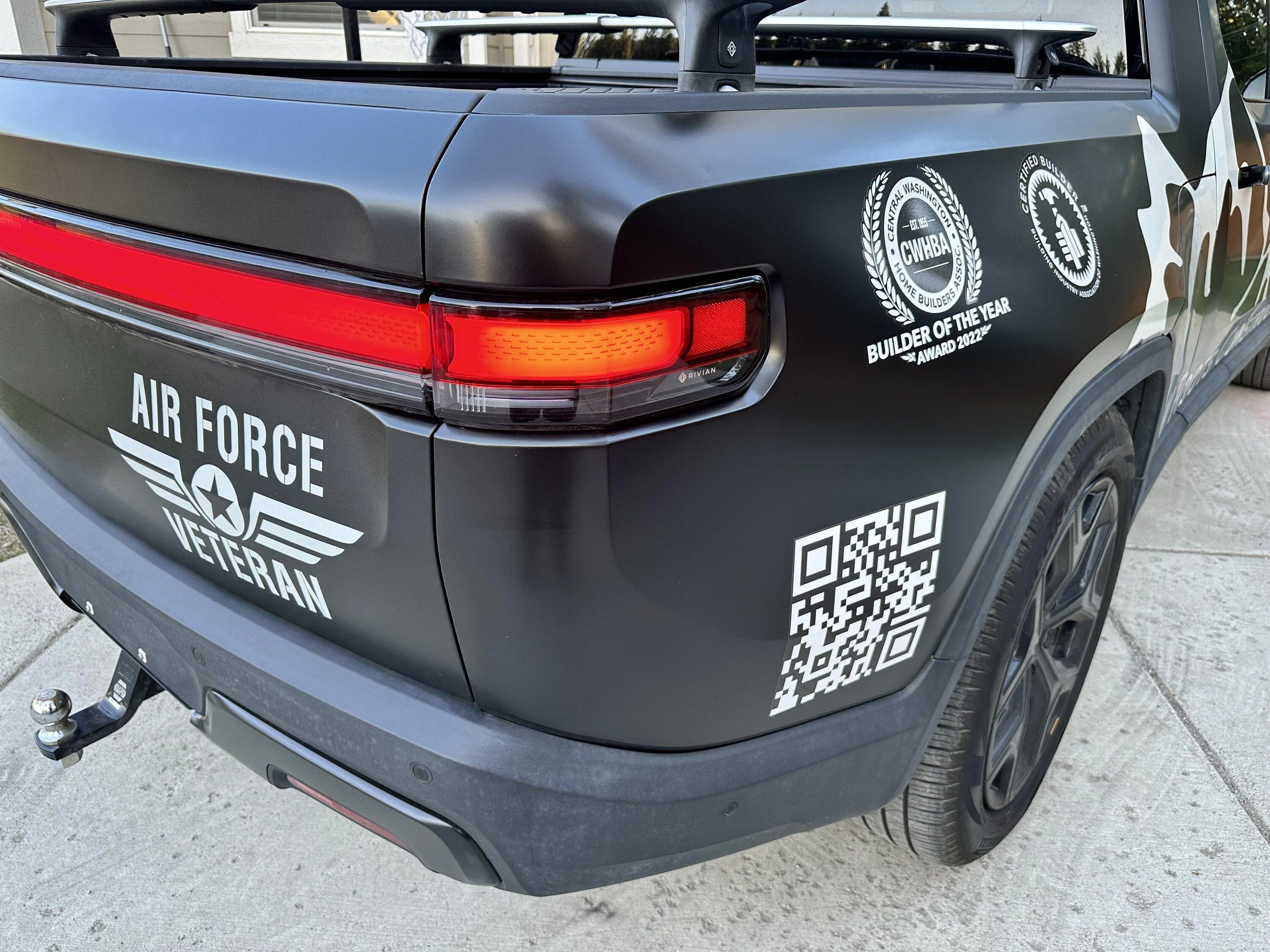 Custom Lettering For Rivian R1t Rootsy (NW Roots Construction) Black Vinyl Wrap | Rivian Forums - R1 R2 ...
