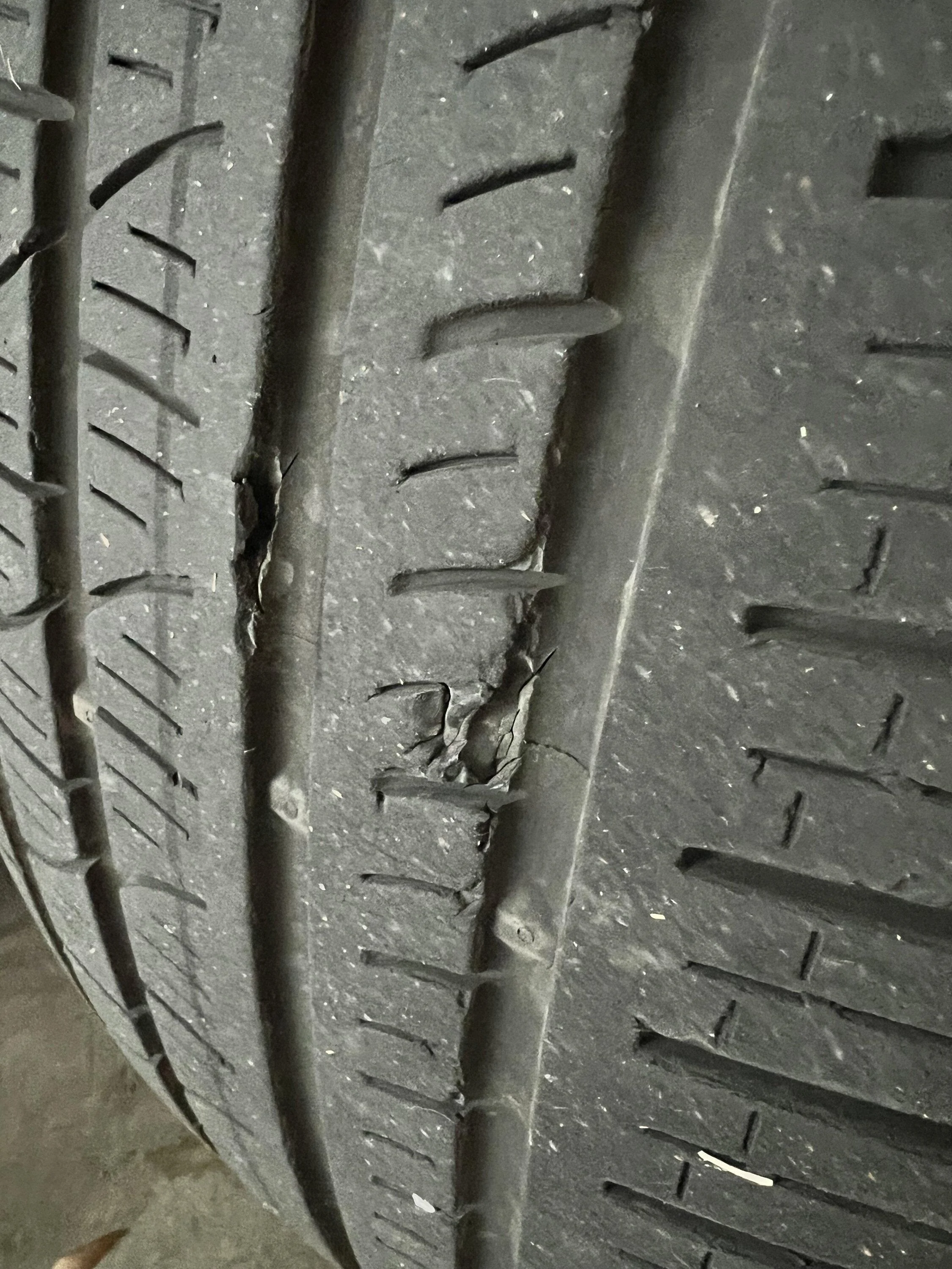 Rivian R1T R1S 21" Tires after 14k miles - Do you have gouges in the tread like this? IMG_1228