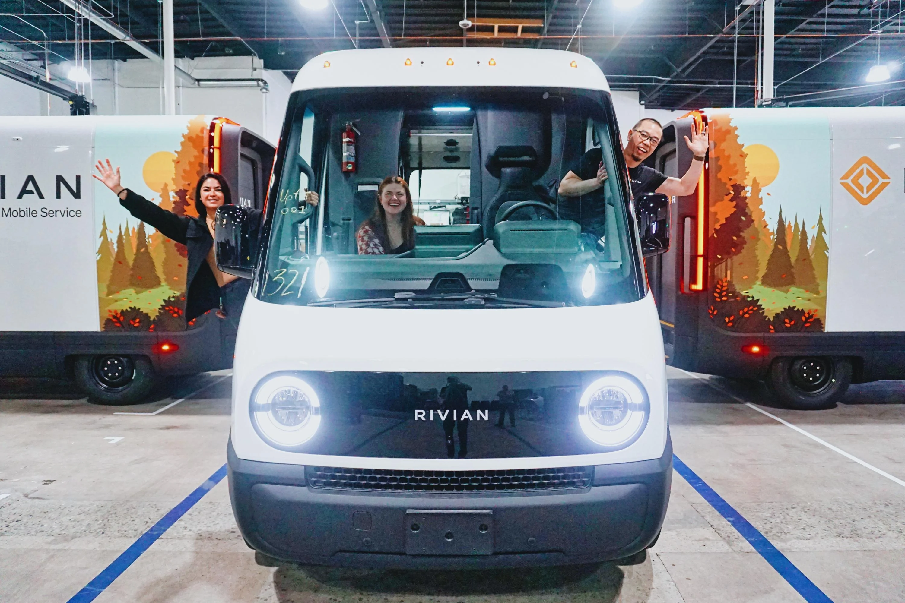 Rivian R1T R1S Official Rivian Story: Fleet of All-Electric Rivian Service Vans Hit The Road original