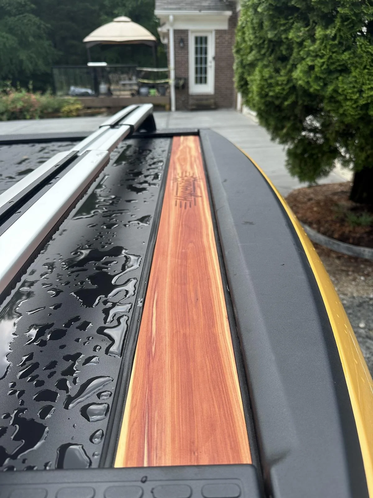Rivian R1T R1S My tramp stamp temporary fix for my powered tonneau 6 installed with weather stripping
