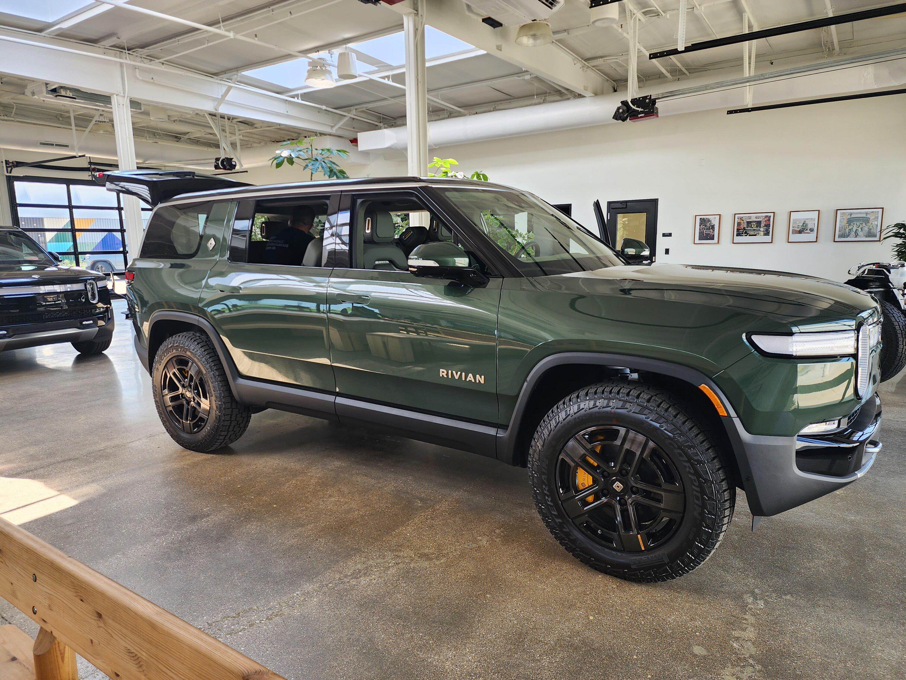 Rivian R1T R1S Picked up my R1S from Rivian factory!! Love the combo: double Forest exterior + interior 20230523_145825