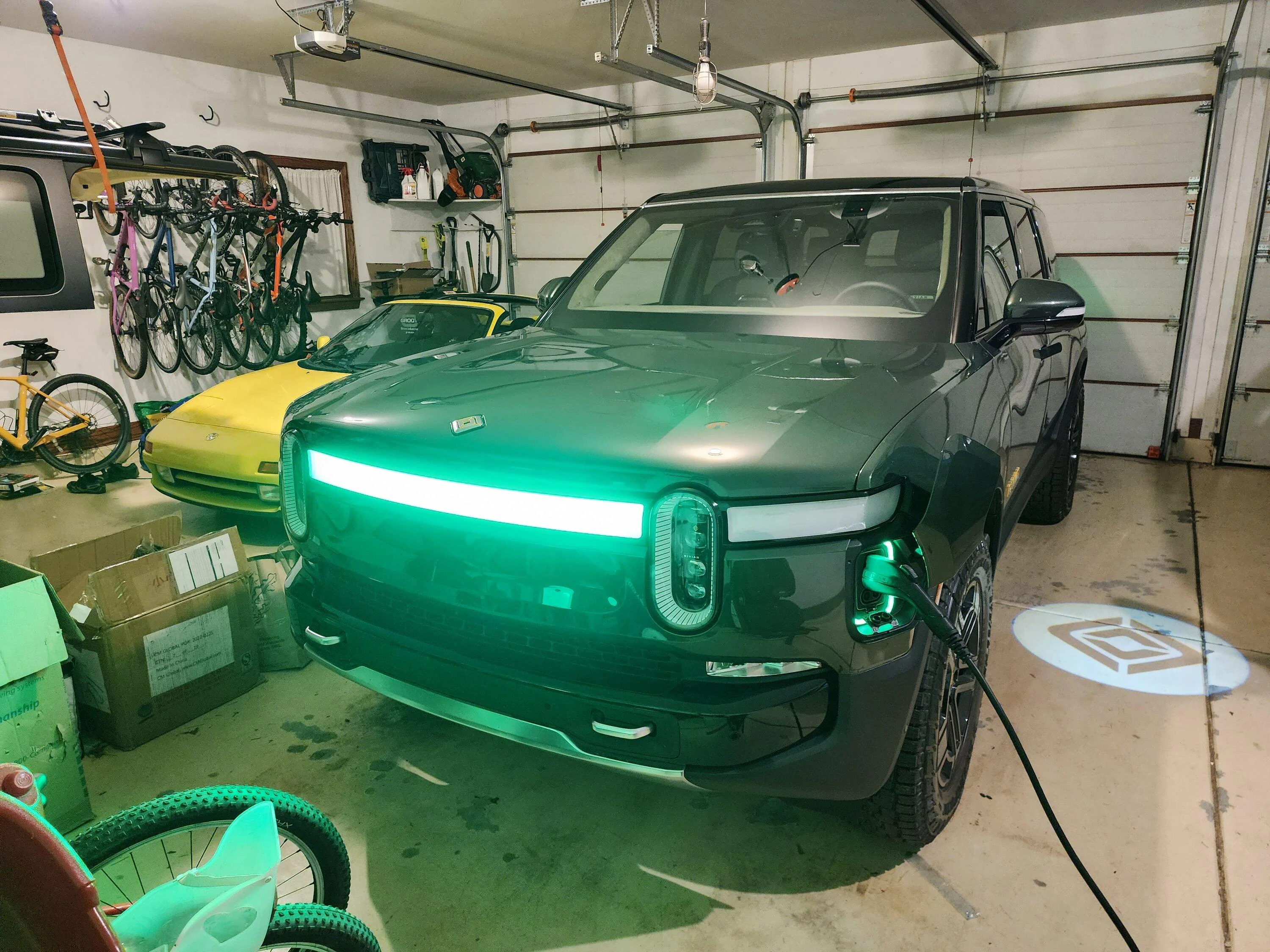 Rivian R1T R1S Picked up my R1S from Rivian factory!! Love the combo: double Forest exterior + interior 20230523_225605