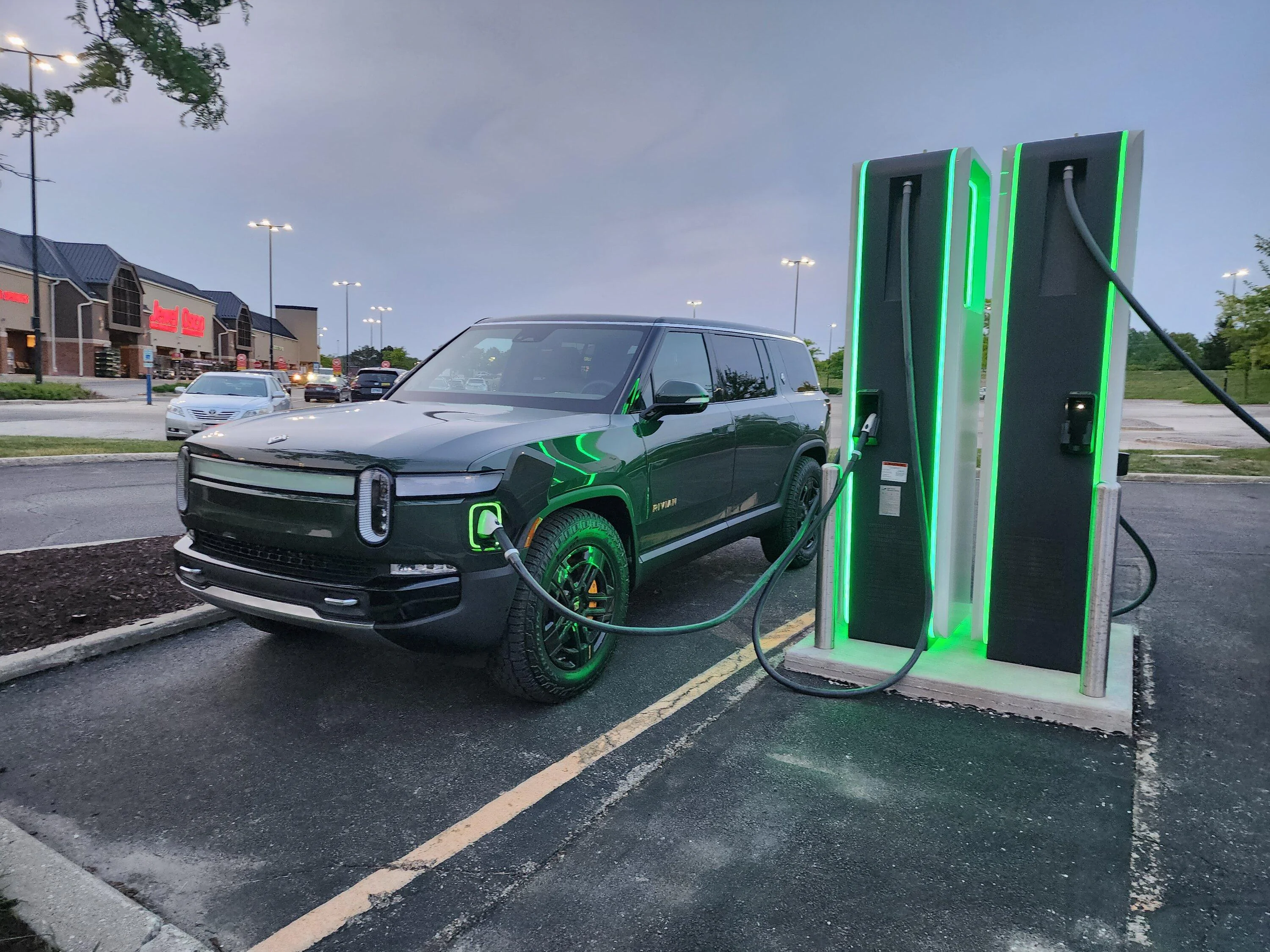 Rivian R1T R1S Picked up my R1S from Rivian factory!! Love the combo: double Forest exterior + interior 20230524_201334