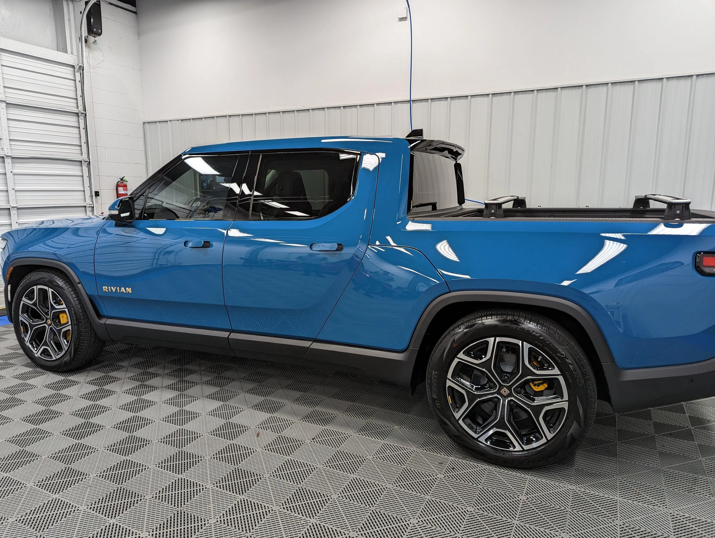 Rivian R1T R1S Progress pics of R1T paint correction, full front PPF, ceramic coat (exterior & interior), tint PXL_20221223_192748182