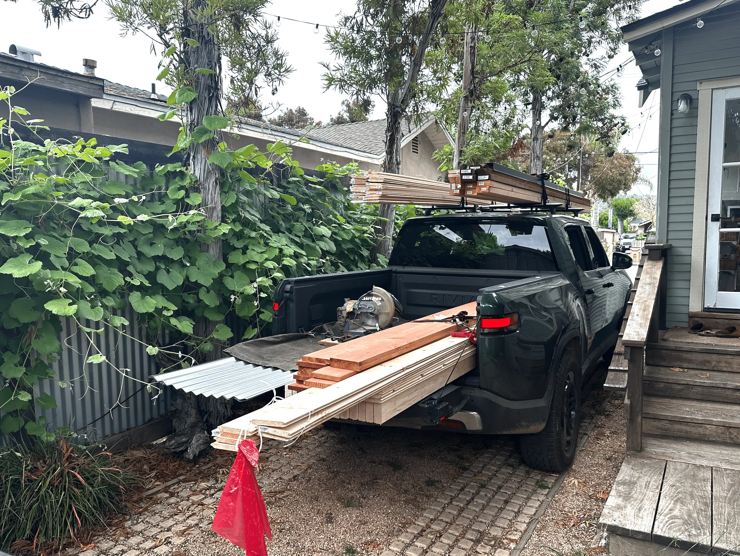 Rivian R1T R1S Drywall sheets?  No problem.  R1T can fit a bunch of 4x8 material with ease. 1685566335386