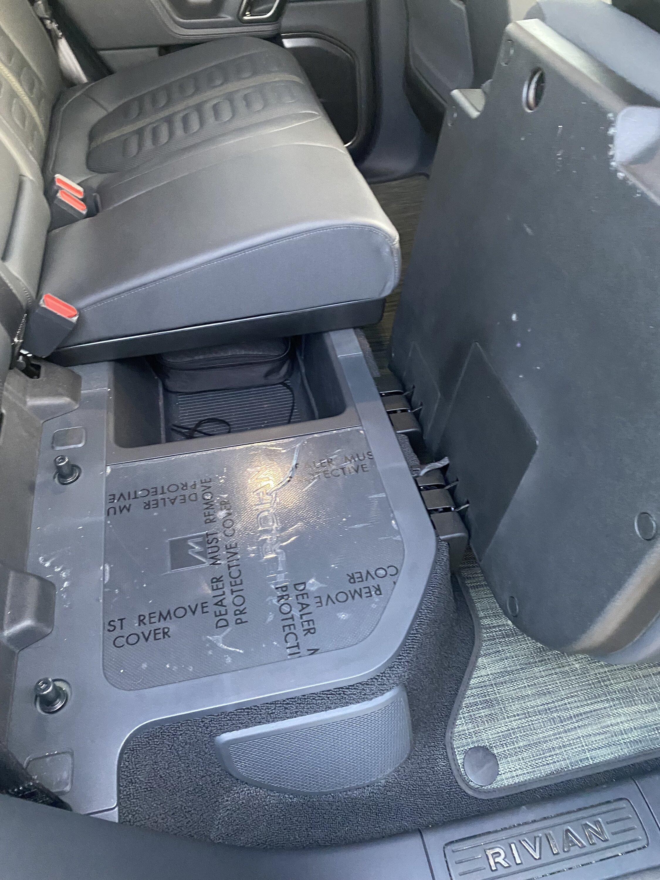 Rivian R1T R1S Factory plastic cover on Meridian audio system IMG_6044