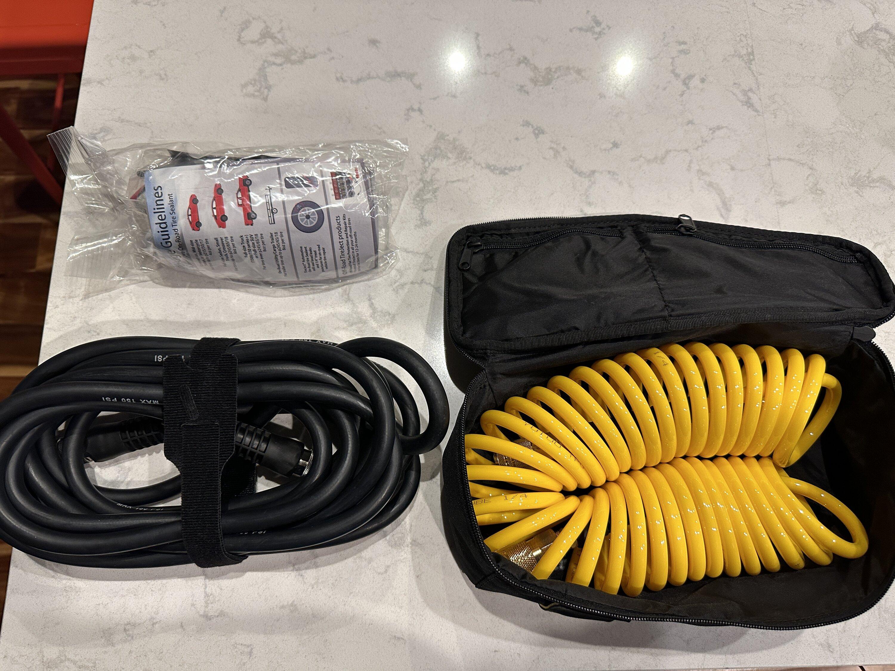Rivian R1T R1S My quick solutions for air hose storage and gear tunnel organization IMG_7803