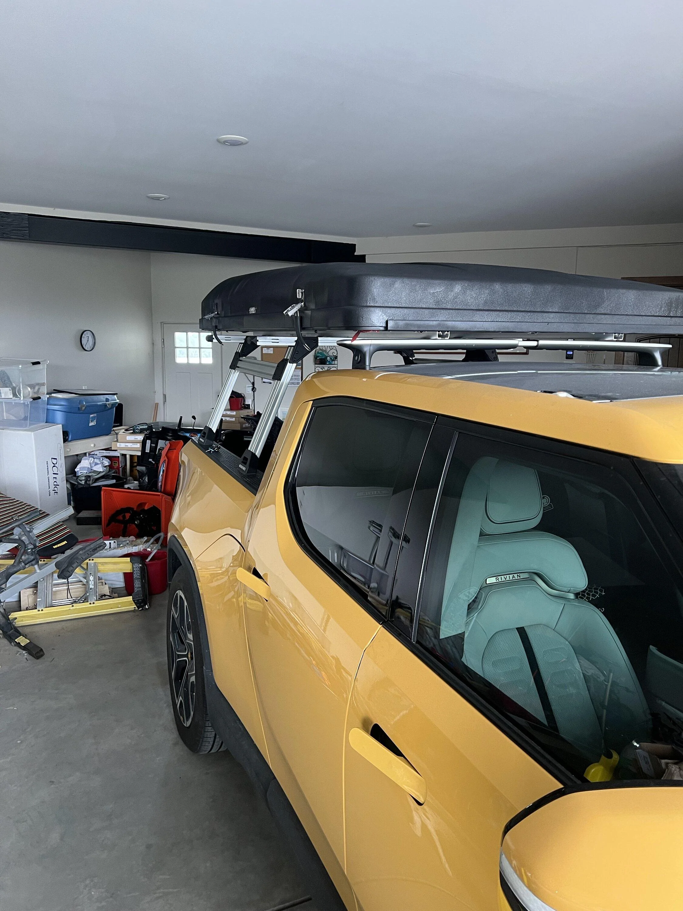 Rivian R1T R1S Installed Marina Rack from Range Industry. Very happy with my Ikamper on top of it. IMG_3094