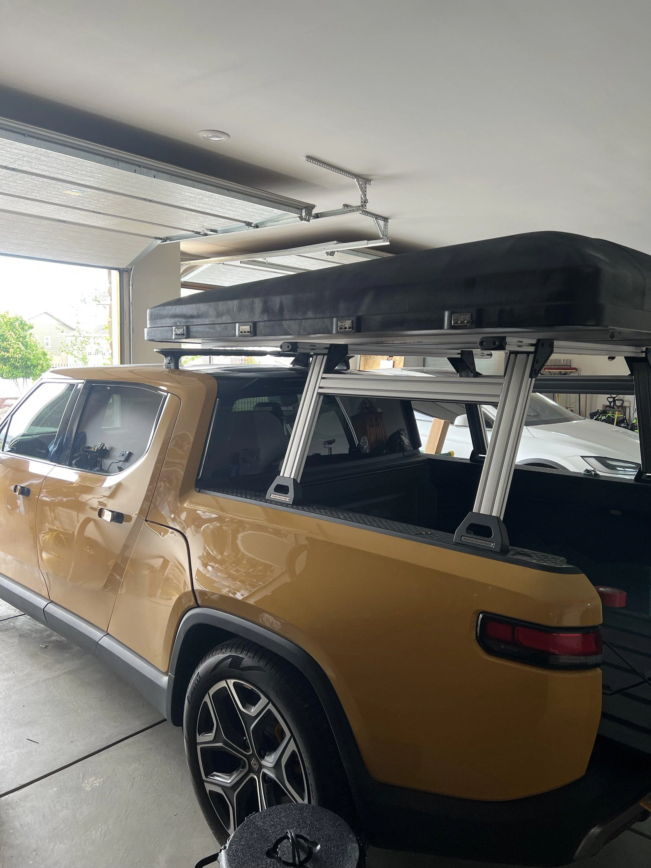 Rivian R1T R1S Installed Marina Rack from Range Industry. Very happy with my Ikamper on top of it. IMG_3090