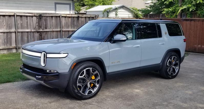 Rivian R1T R1S 22s Bright to 22s Blacked Out Wheels in 5 Hours using vinyl decals Rivian stock.JPG