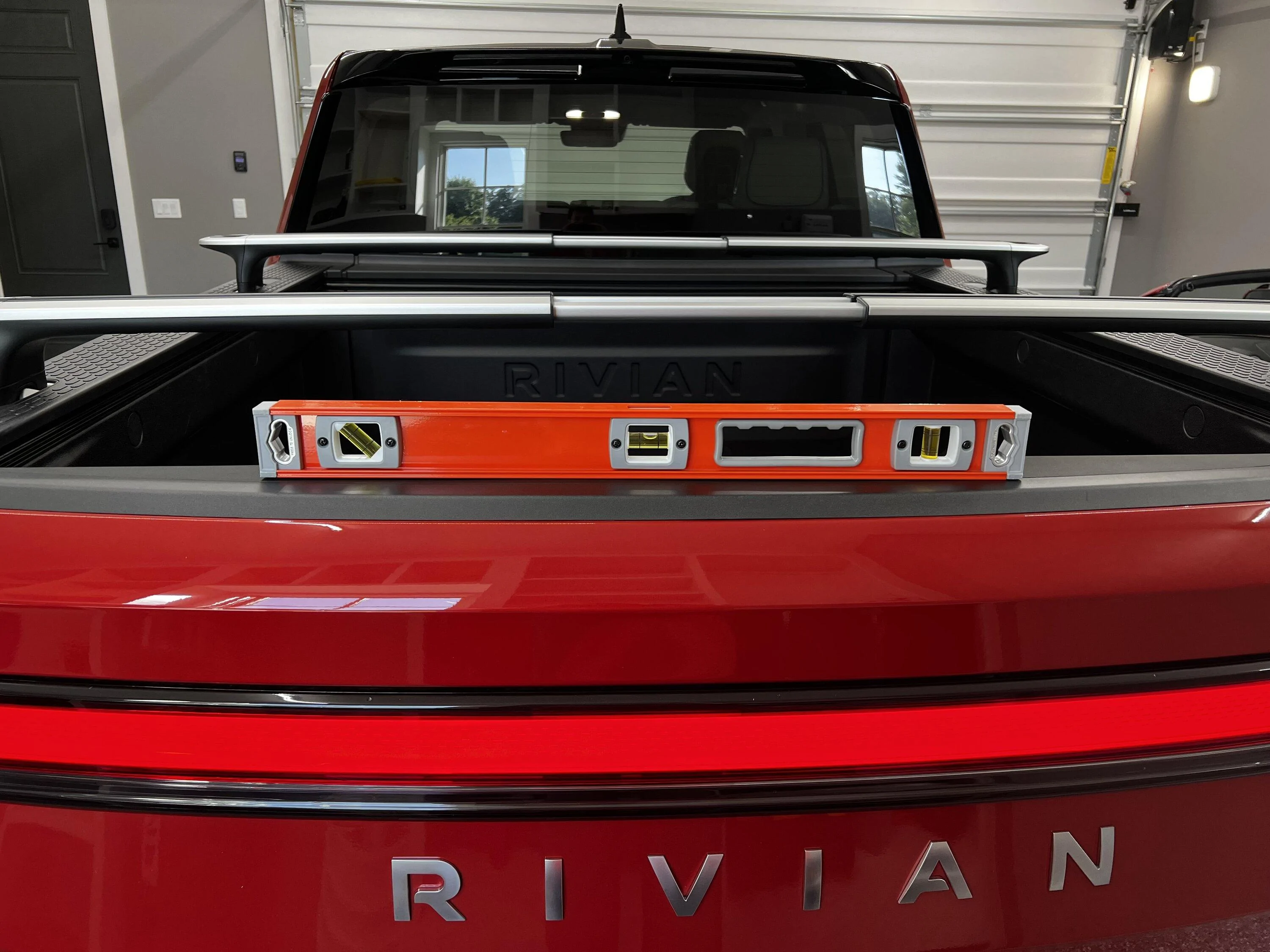 Rivian R1T R1S Passenger side lower than driver side. IMG_1578