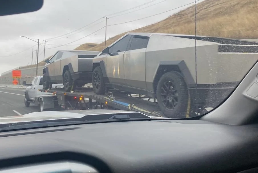 Rivian R1T R1S Tesla Cybertruck Went From Exoskeleton Marvel to Unibody Honda Ridgeline Competitor tesla-cybertruck-tow-towed-towing-trailer-1-jpeg