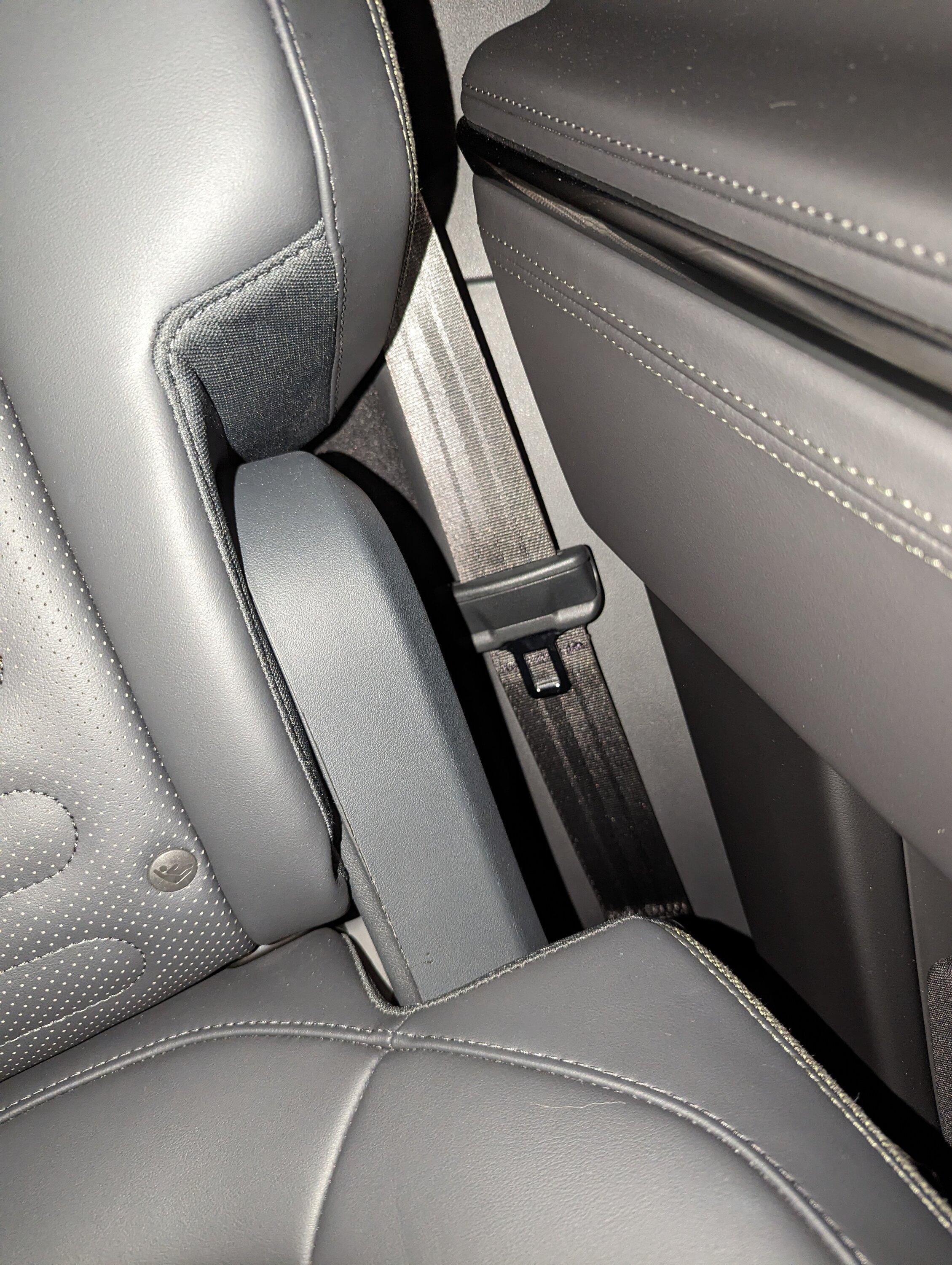 Rivian R1T R1S My R1S both damaged @ inside door panel -- Design flaw? r1s_seatbelt