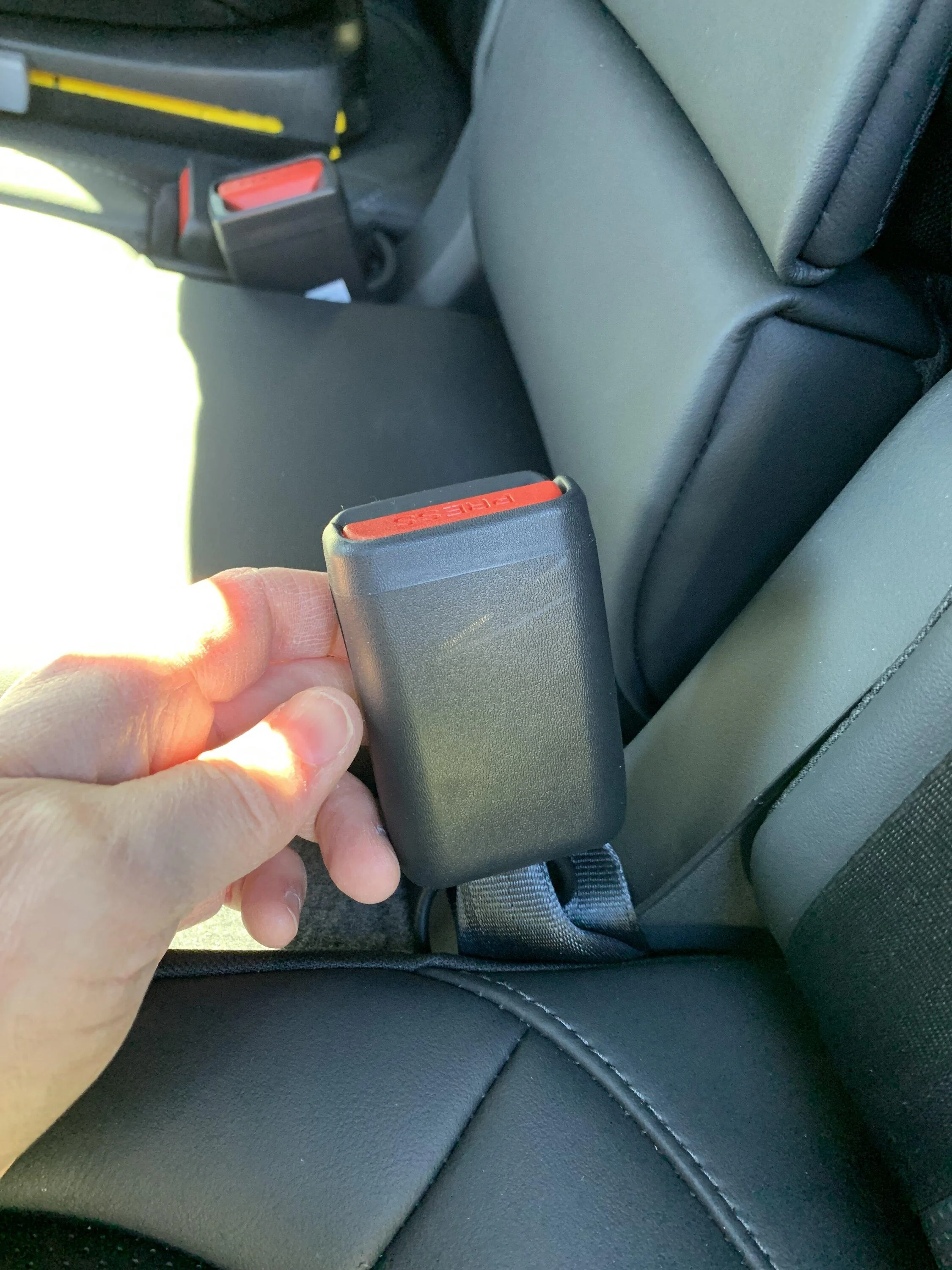 Rivian R1T R1S Car seat buckle backwards? IMG_0500