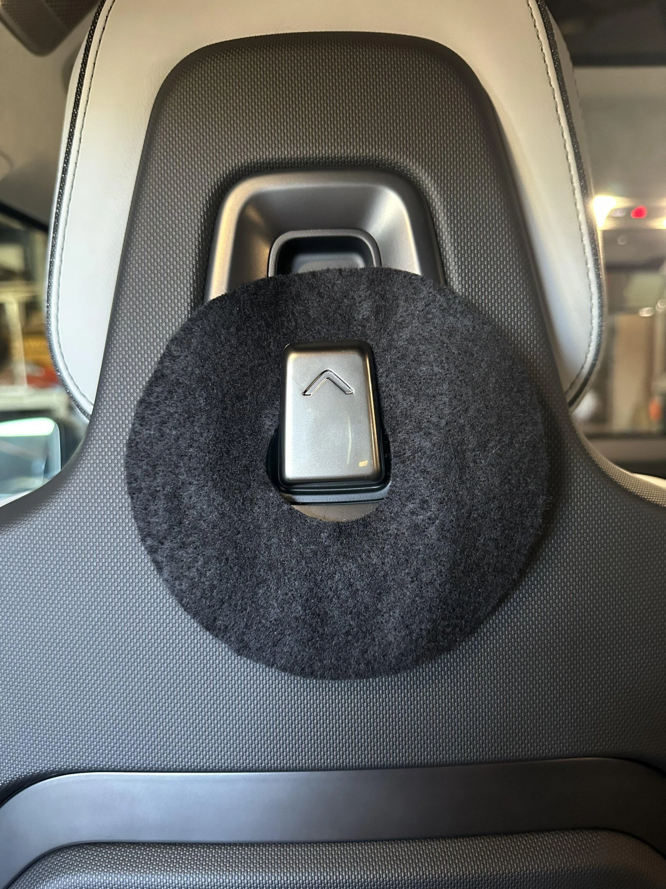 Rivian R1T R1S PSA - Don't use the hooks behind the front seats to hang your dry cleaning :( IMG_2486