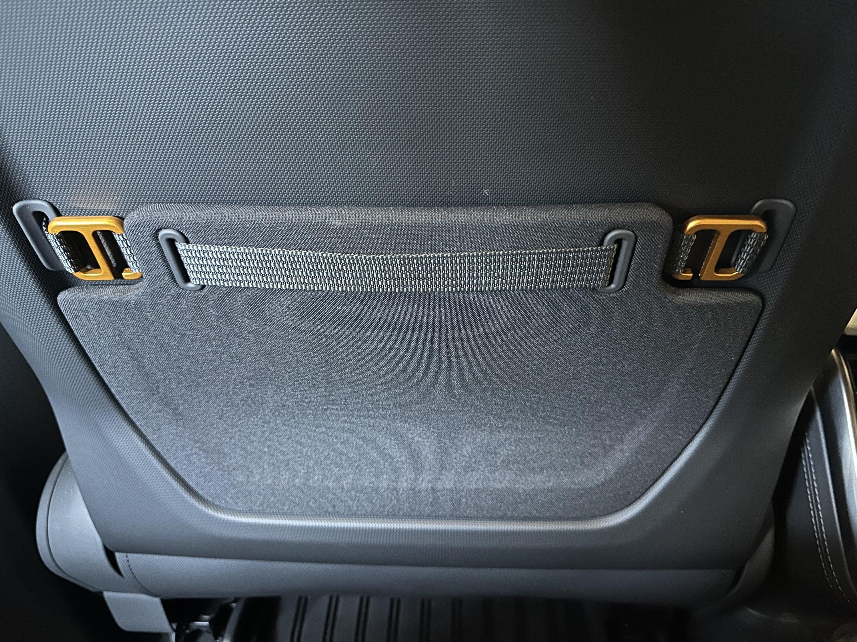 Rivian R1T R1S PSA - Don't use the hooks behind the front seats to hang your dry cleaning :( IMG_2487
