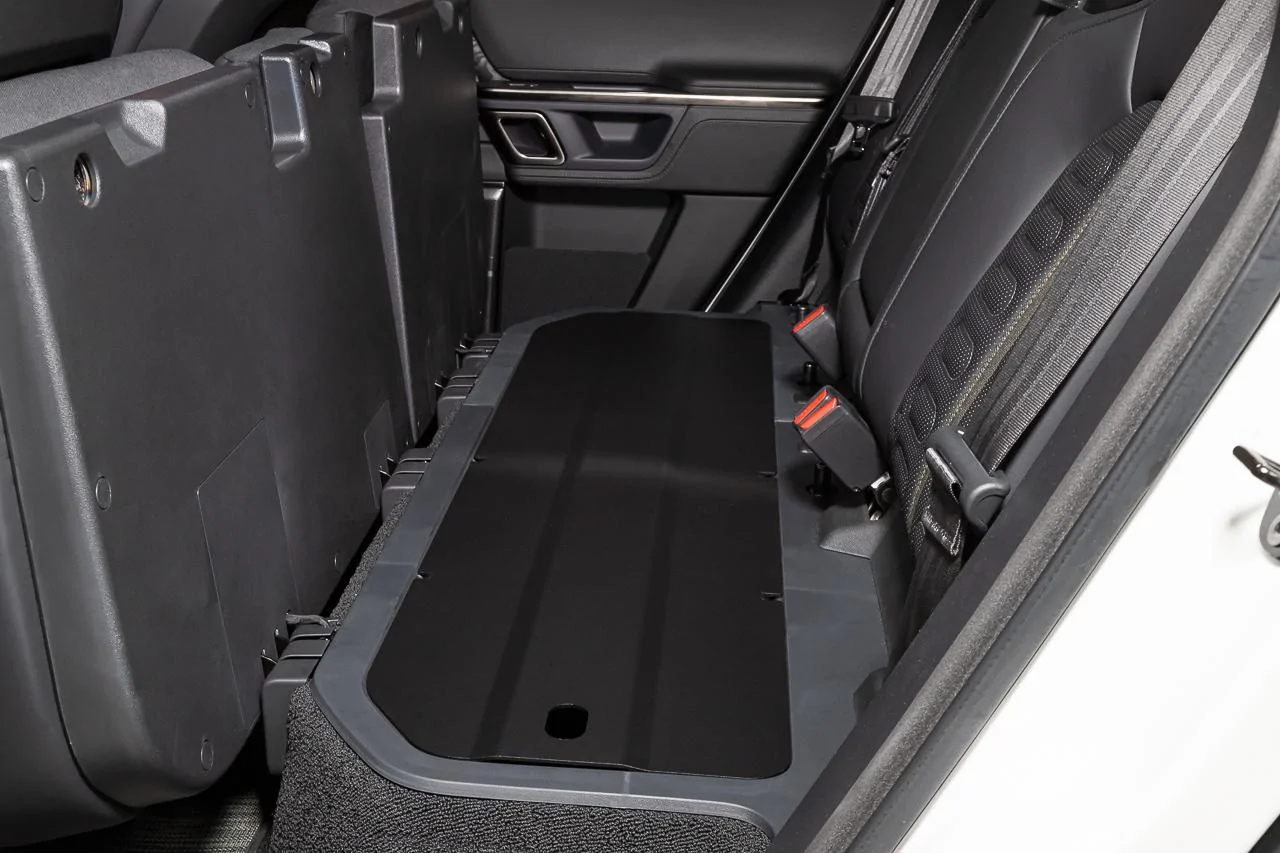 Rivian R1T R1S R1T Under Rear Seat Cargo Covers & Dog / Pet Decks have lauched! New at EVSportine.com evsportline-r1t-rear-seat-platform-in-car-1