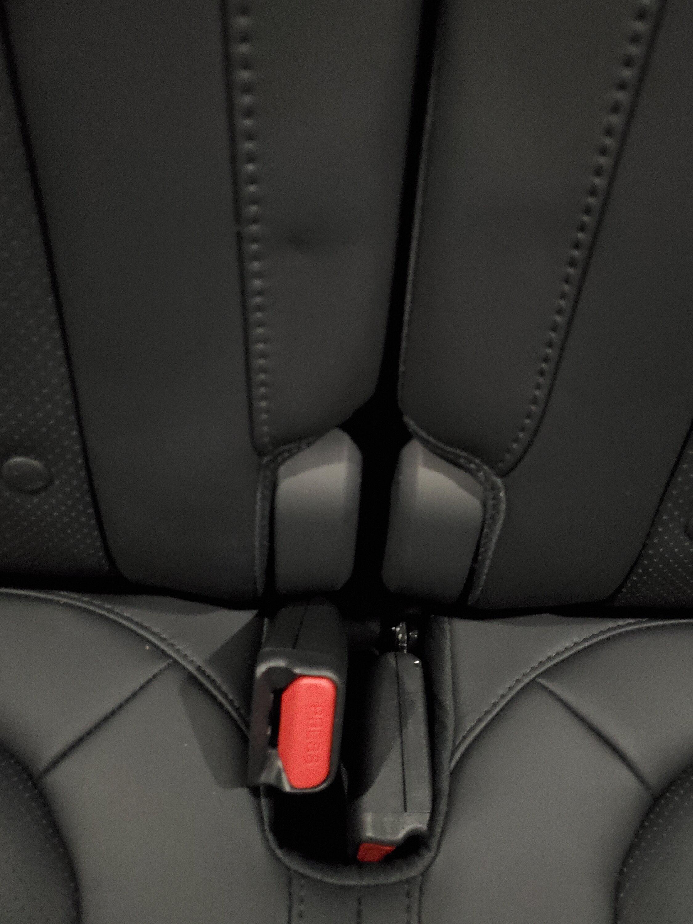 Rivian R1T R1S Is this normal? Third row seat belt buckle indenting seat cushion 20230519_080835