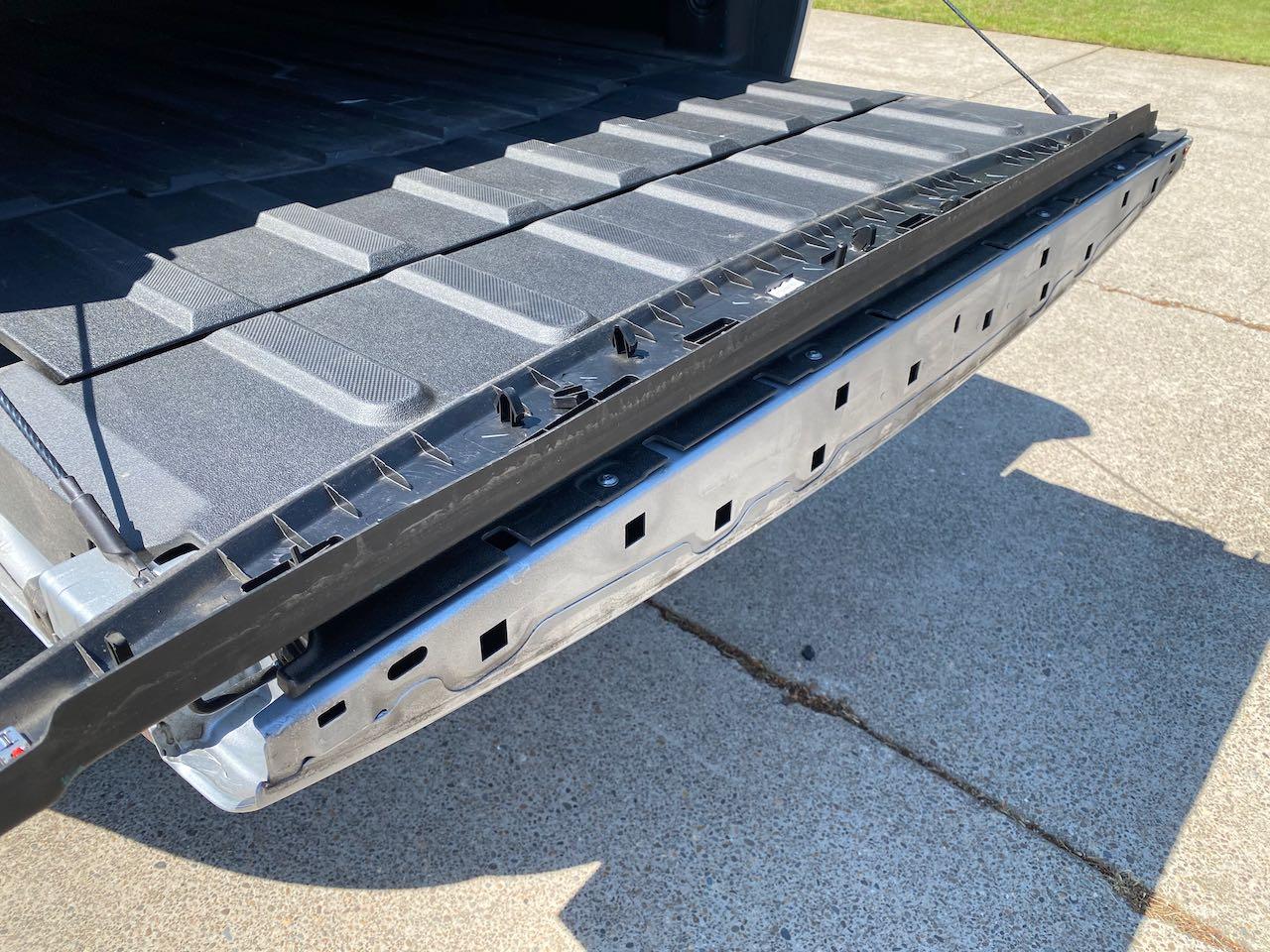 Rivian R1T R1S Safety issue: tailgate top molding fall apart too easy. IMG_4481 (1)