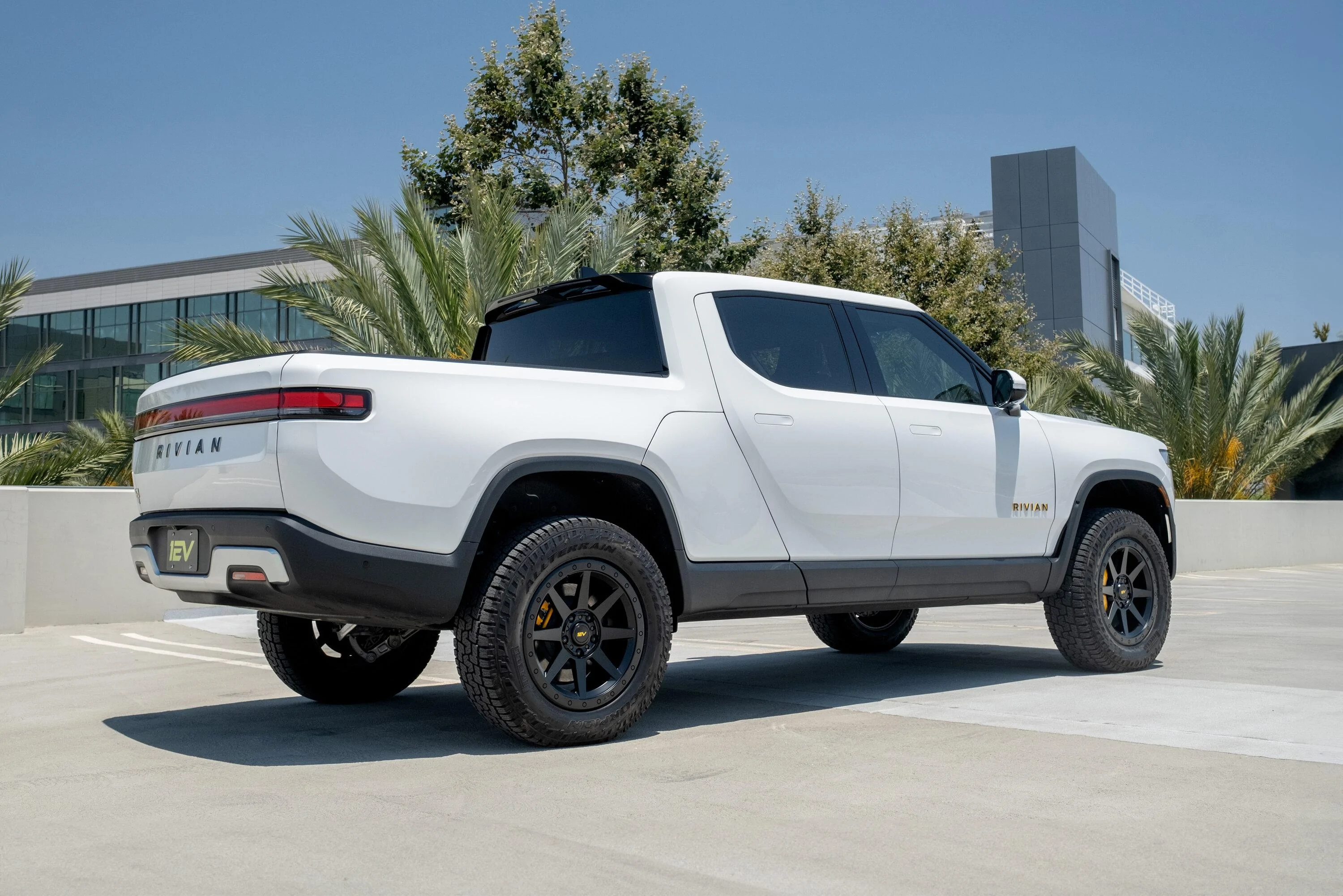 Rivian R1T R1S New 20" Aftermarket Wheels - R800 Compass 8 Spoke In Satin Black or Adventure Bronze by Team 1EV / EV Sportline glacier-white-rivian-aftermarket-wheels-20-r800-satin-black-offroad-3