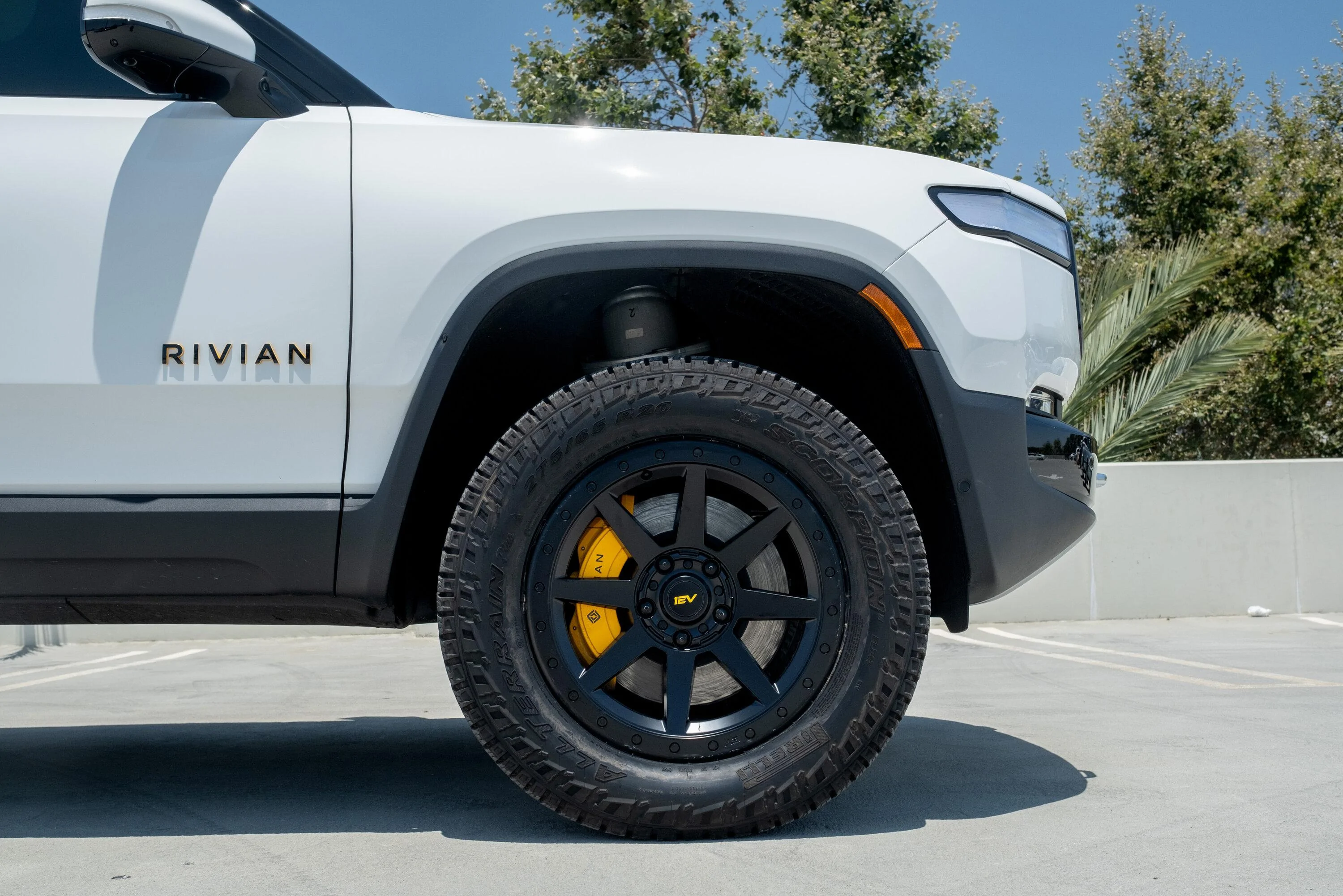 Rivian R1T R1S New 20" Aftermarket Wheels - R800 Compass 8 Spoke In Satin Black or Adventure Bronze by Team 1EV / EV Sportline glacier-white-rivian-aftermarket-wheels-20-r800-satin-black-offroad-4
