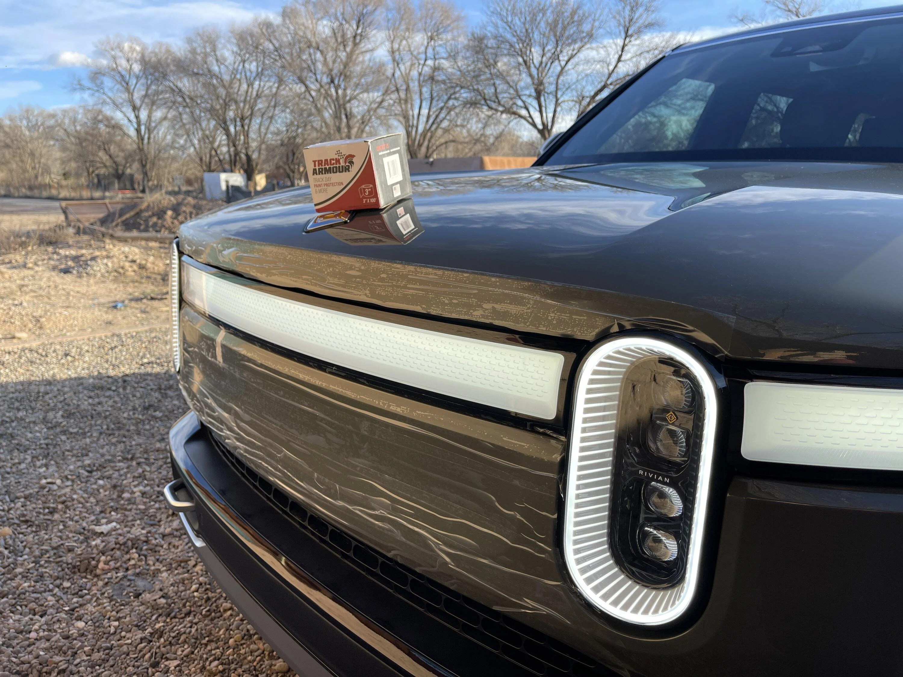 Rivian R1T R1S PSA: Off-roading with tree branches?  Stuff your crack with rubber. 1689432051750