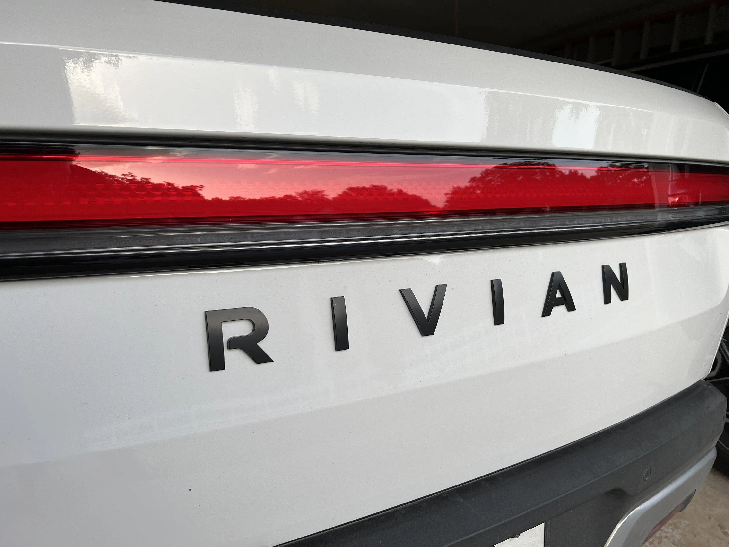 Rivian R1T R1S Blacked out my logos with vinyl IMG_6901