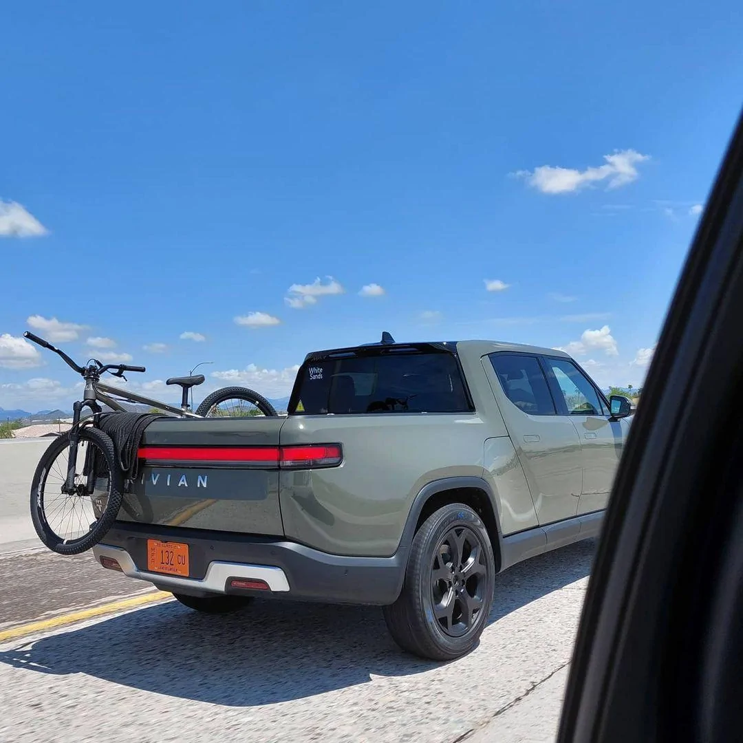 Rivian R1T R1S Real Rivian Photos & Videos Rivian Launch Green sunlight outdoors 1