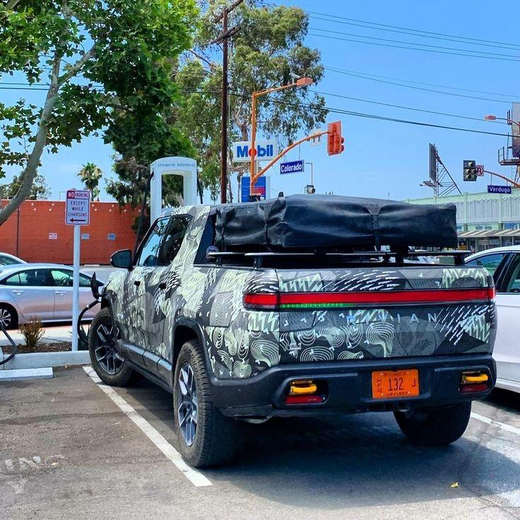 Rivian R1T R1S Clear look at green charging status light bar (on R1T)! 891dddf635de4c69c60991c2c1c1c27c
