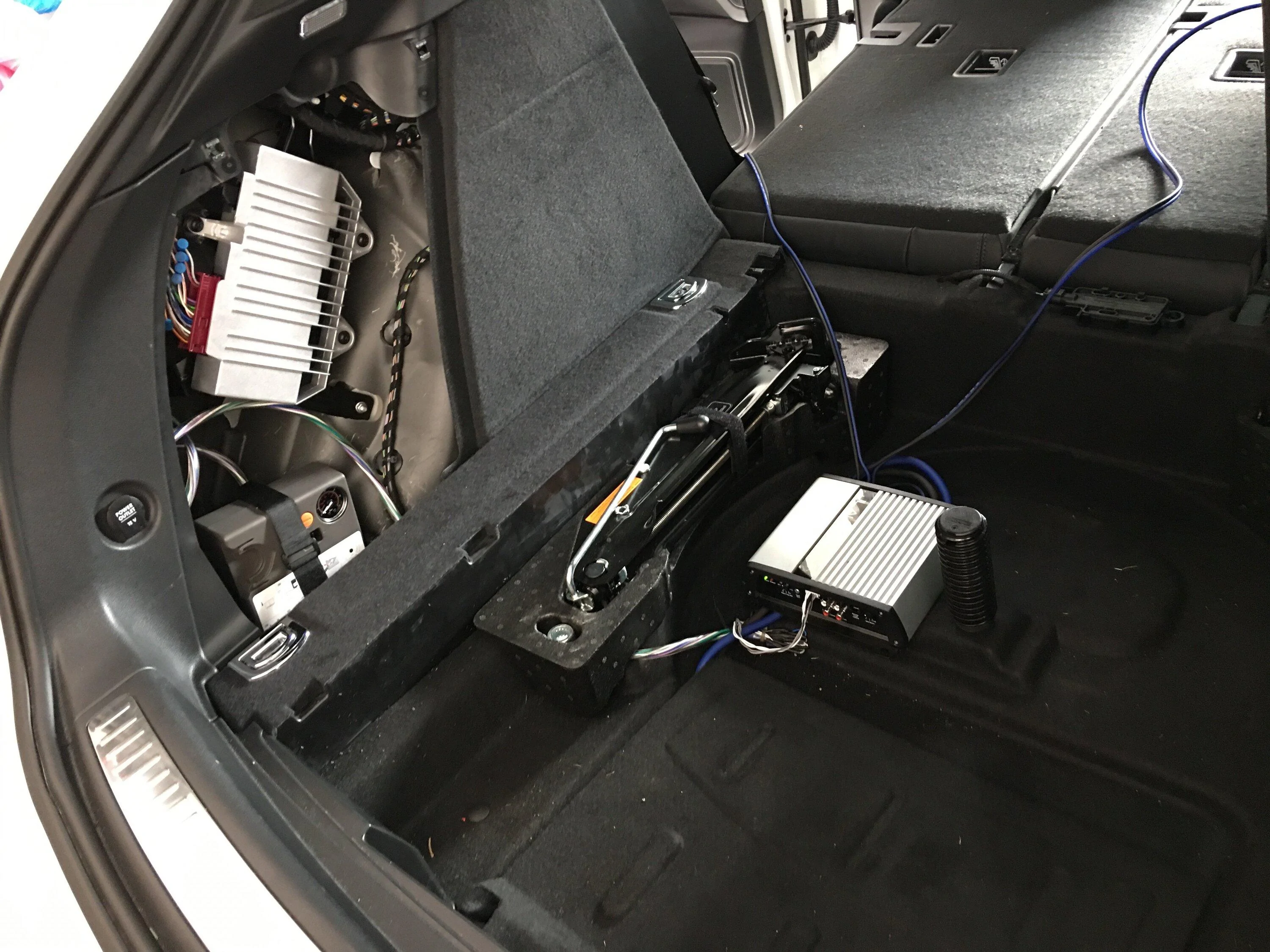 Rivian R1T R1S Teardown: R1S Audio Unit under drivers seat and speaker harness pinnout. IMG_5335