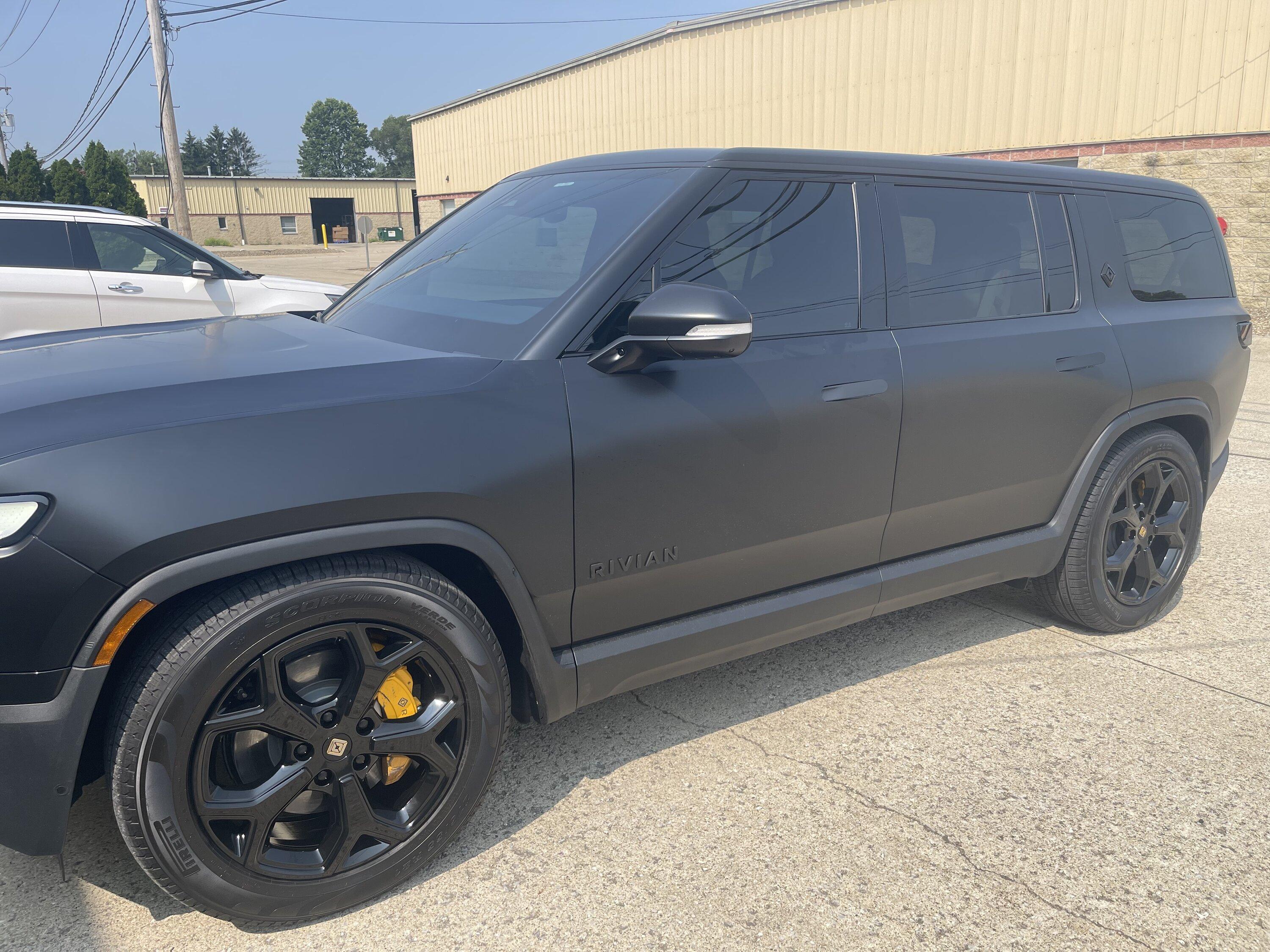 Rivian R1T R1S Blacked Out Stealth Wrapped Entire R1S IMG_3527