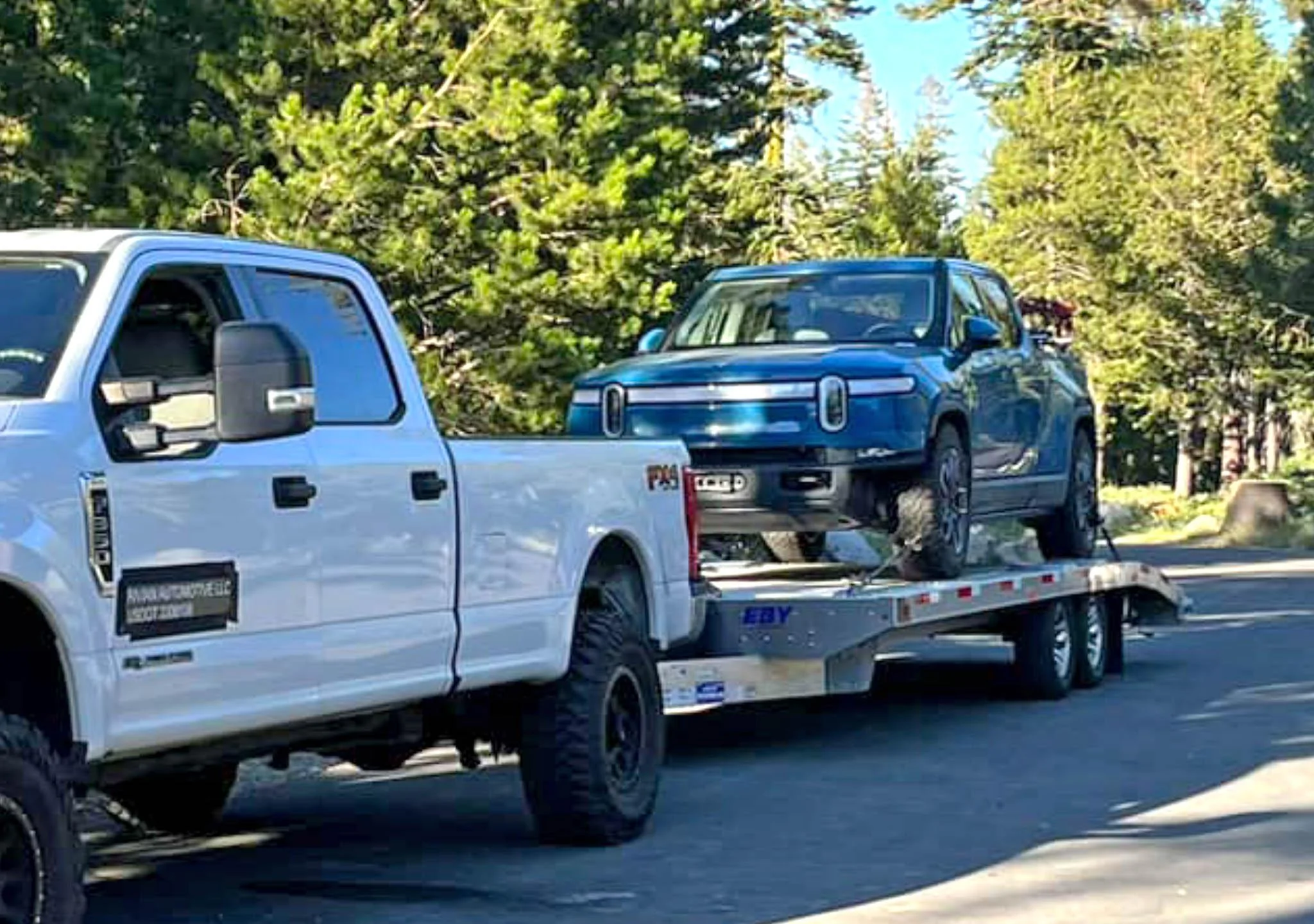 rivian r1t sliders rock rails winch.jpg