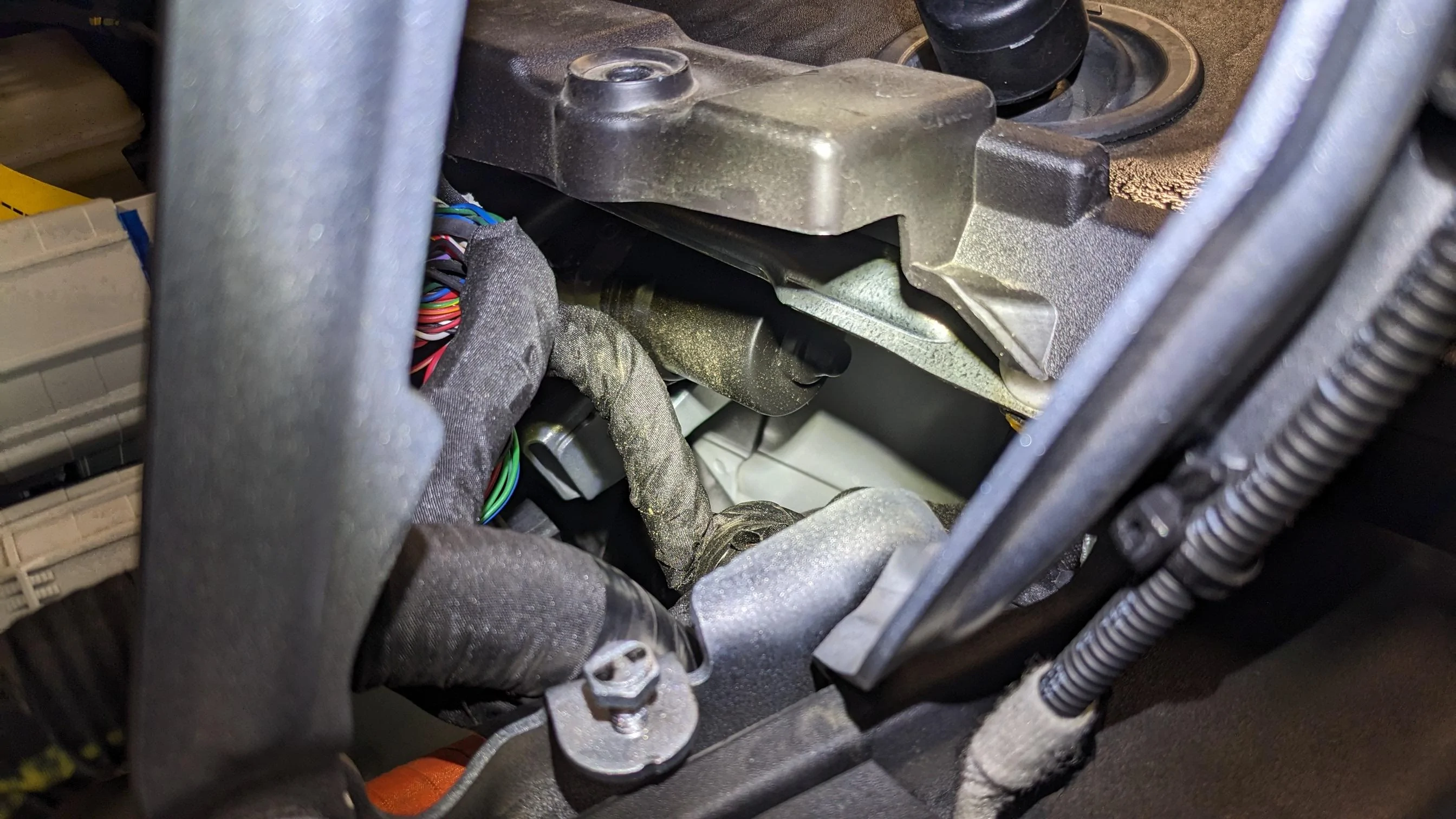 Rivian R1T R1S Wiper mechanism potentially cutting wire harness PXL_20230815_043322799