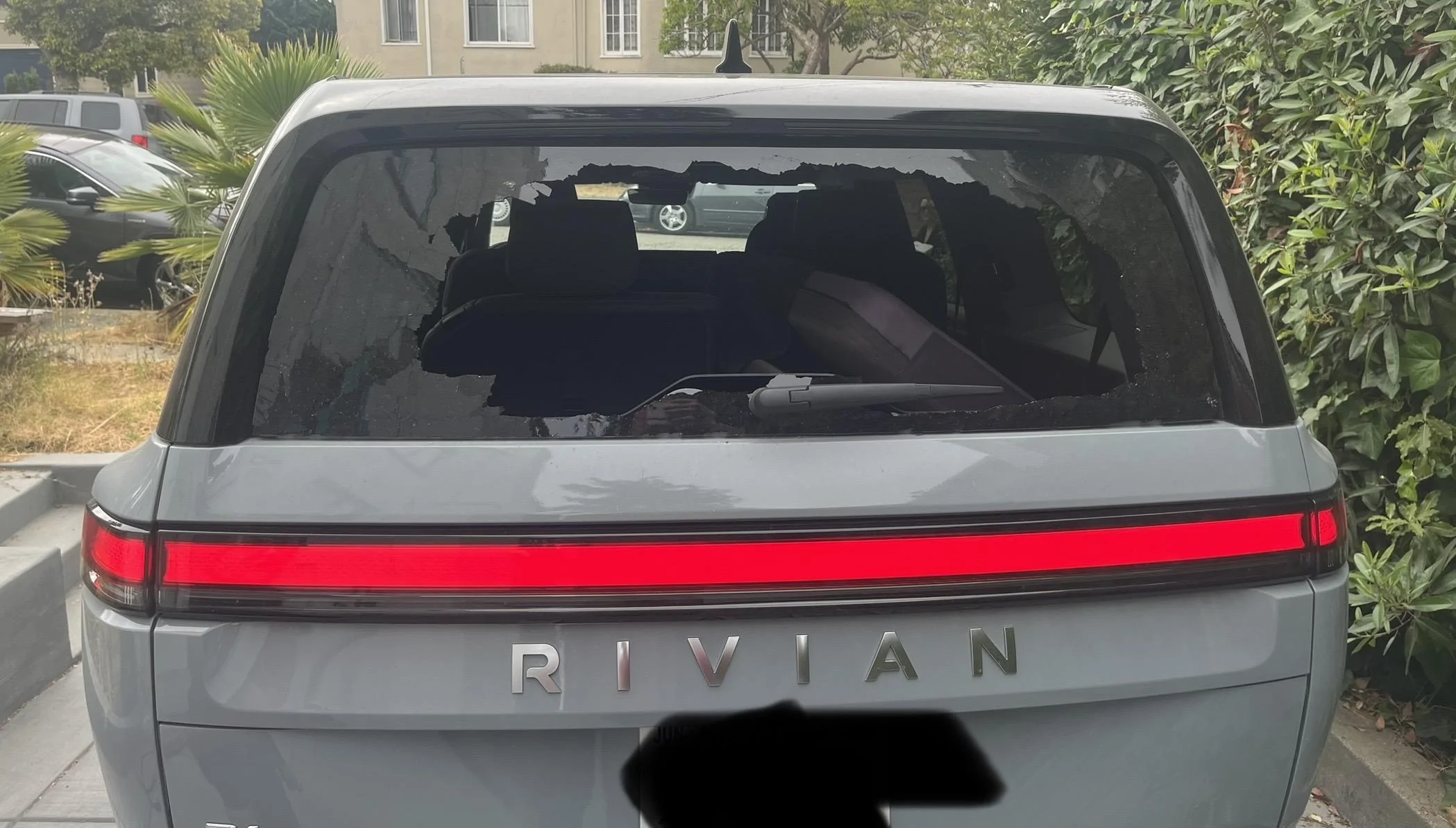 Rivian R1T R1S Back window replacement needed -- pricing and availability? IMG_5155