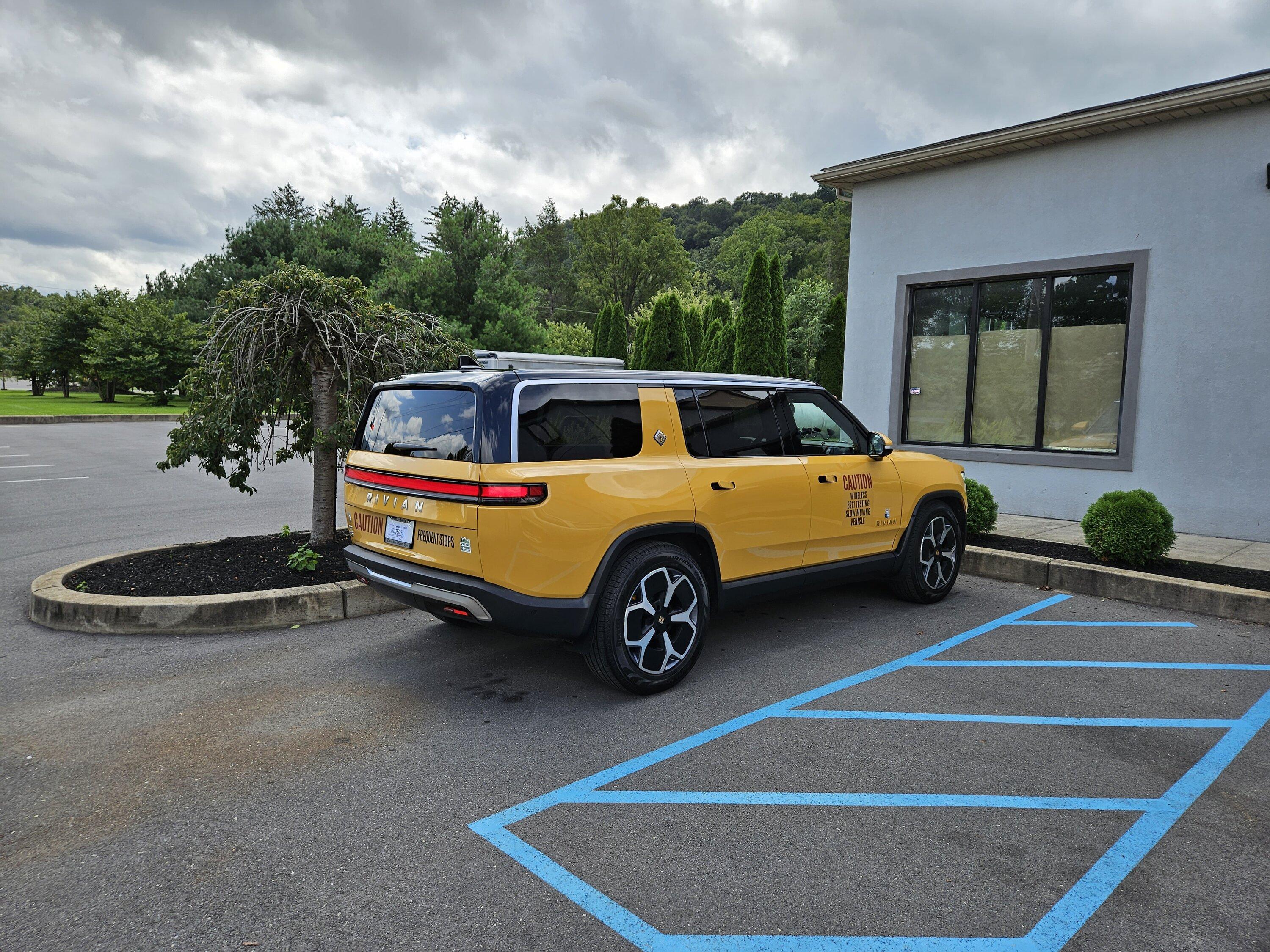 Rivian R1T R1S First tire rotation completed -- my experience 20230827_122857