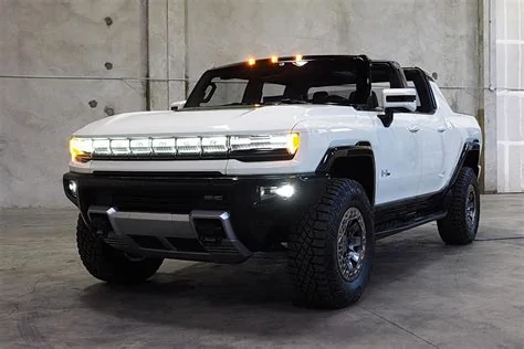 Rivian R1T R1S R1S vs Hummer EV SUV size comparison side-by-side hummer ev