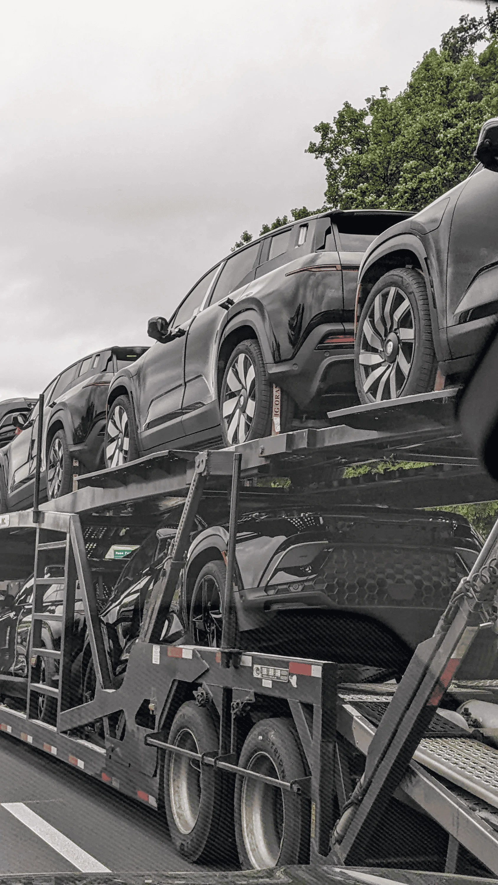 Rivian R1T R1S Truckload of Fisker Ocean's 1693269119140
