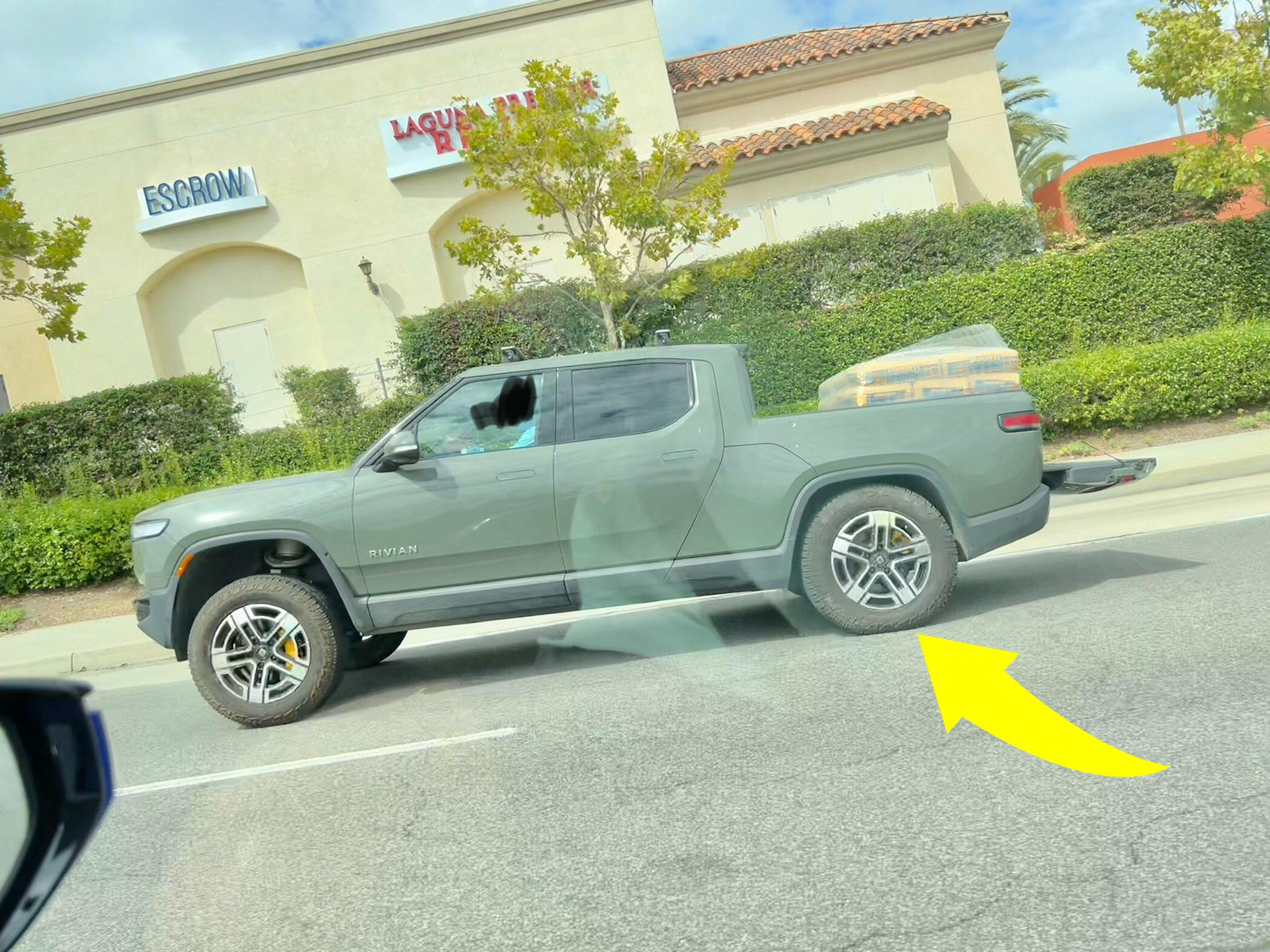 Rivian R1T R1S What Are You Hauling (or Hauled) in your Rivian? 🦾 rivian-r1t-gets-the-toughest-of-jobs-squats-while-hauling-a-pallet-of-concrete-mix-220572_1