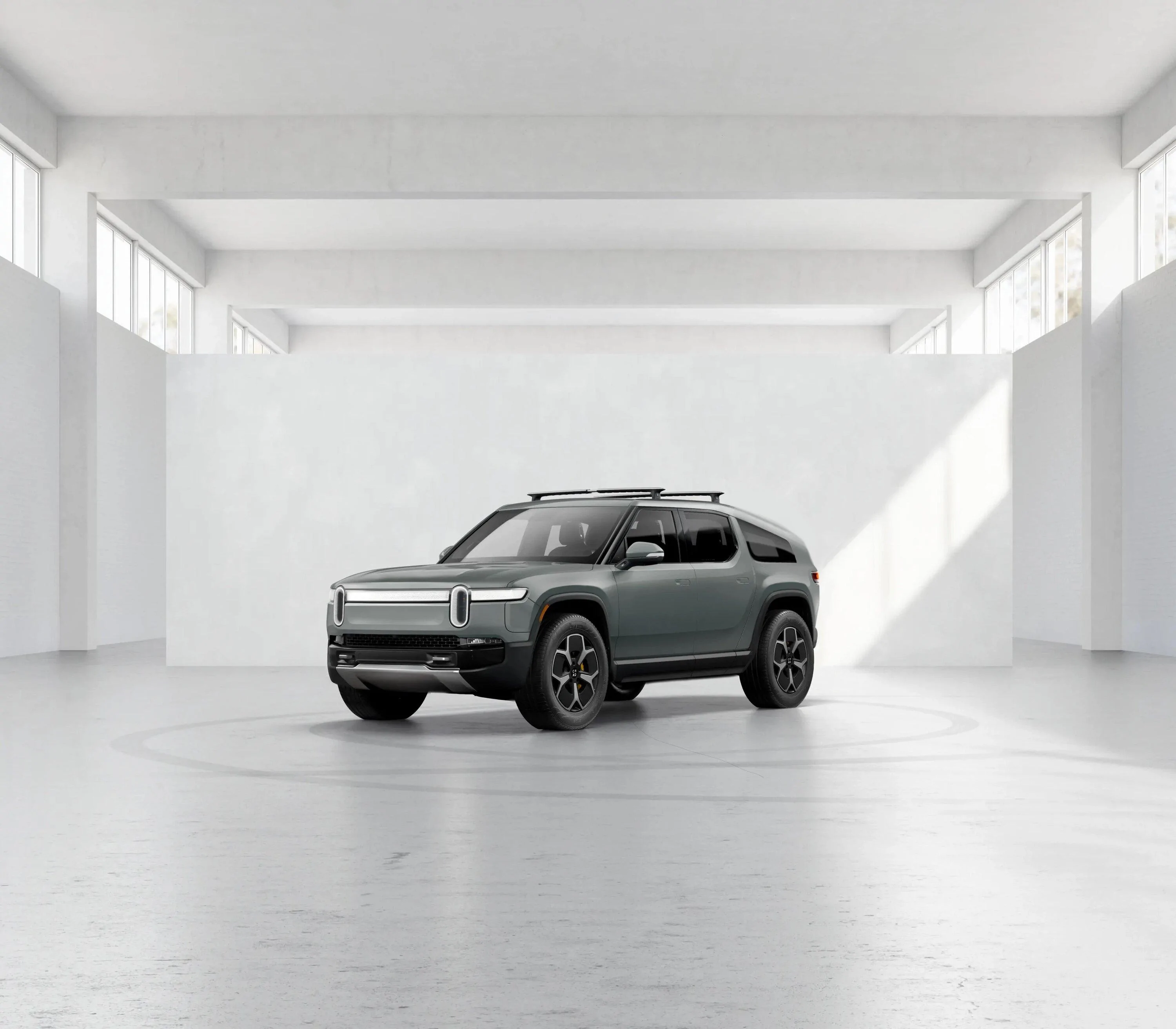 Rivian R1T R1S Rivian R2 design renderings D165238A-AE5A-4E34-ABDC-5D364C7AE19A