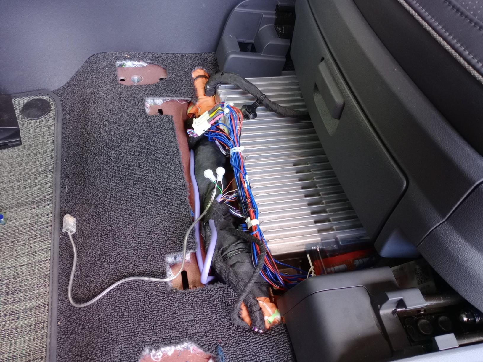 Rivian R1T R1S Teardown: R1S Audio Unit under drivers seat and speaker harness pinnout. IMG_20230902_091036