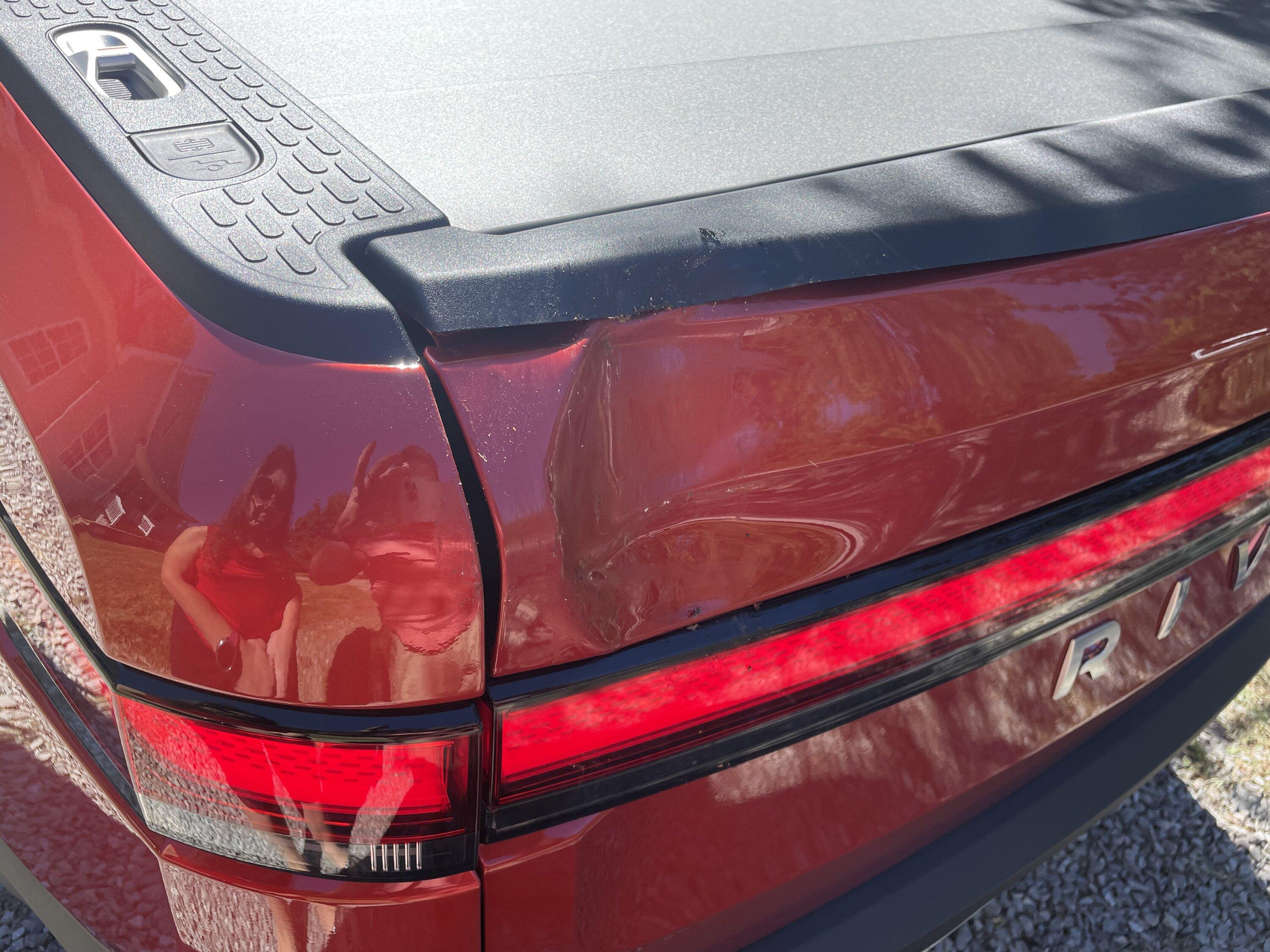 Rivian R1T R1S Hit by an EDV while sitting at the service center IMG_1227