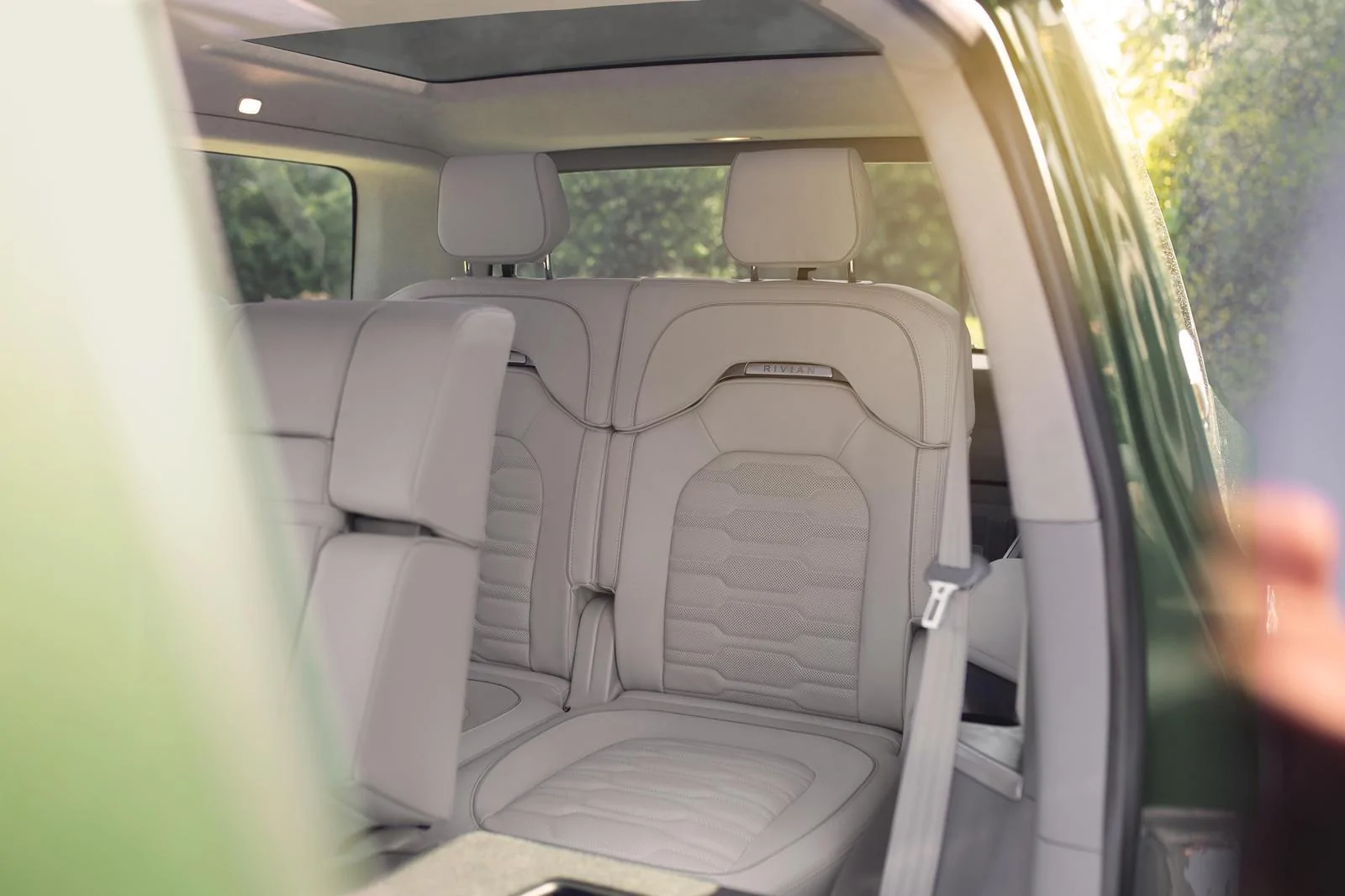 Rivian R1T R1S Are there any products you need for the Rivian and nobody made yet? 2023-rivian-r1s-suv-rear-passenger-seats-carbuzz-659809-1600