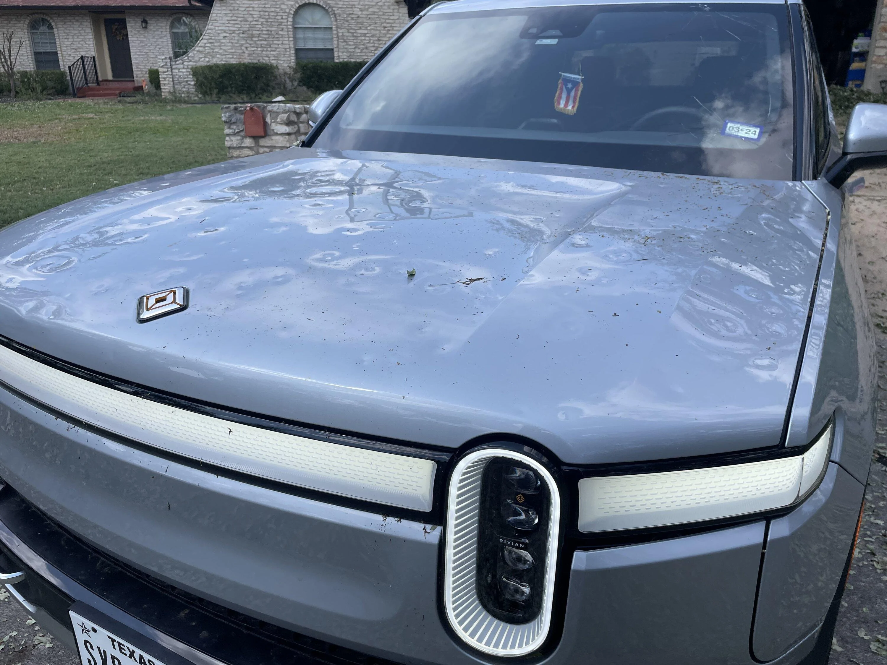 Rivian R1T R1S Hail storm destroys my Rivian R1T IMG_1905