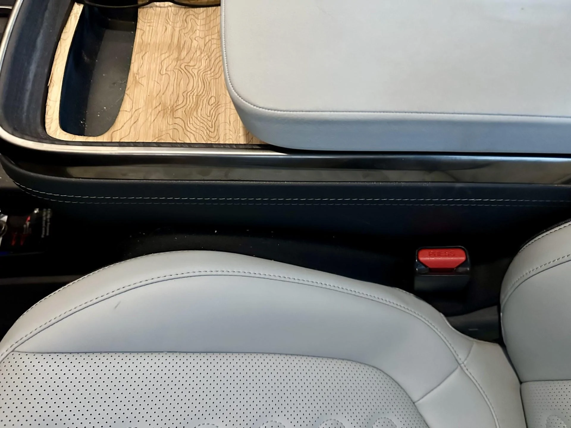 Rivian R1T R1S Bermuda triangle protection.  i.e. The area between seats and center console. seat-gap-protector