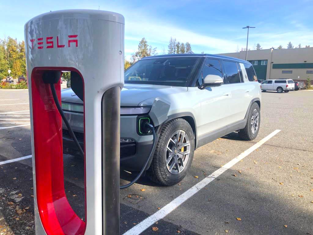 Rivian R1T R1S Tesla Magic Dock Supercharger install crew uses Rivian as test vehicle in Alaska F7C8EeCbUAAxSJ9
