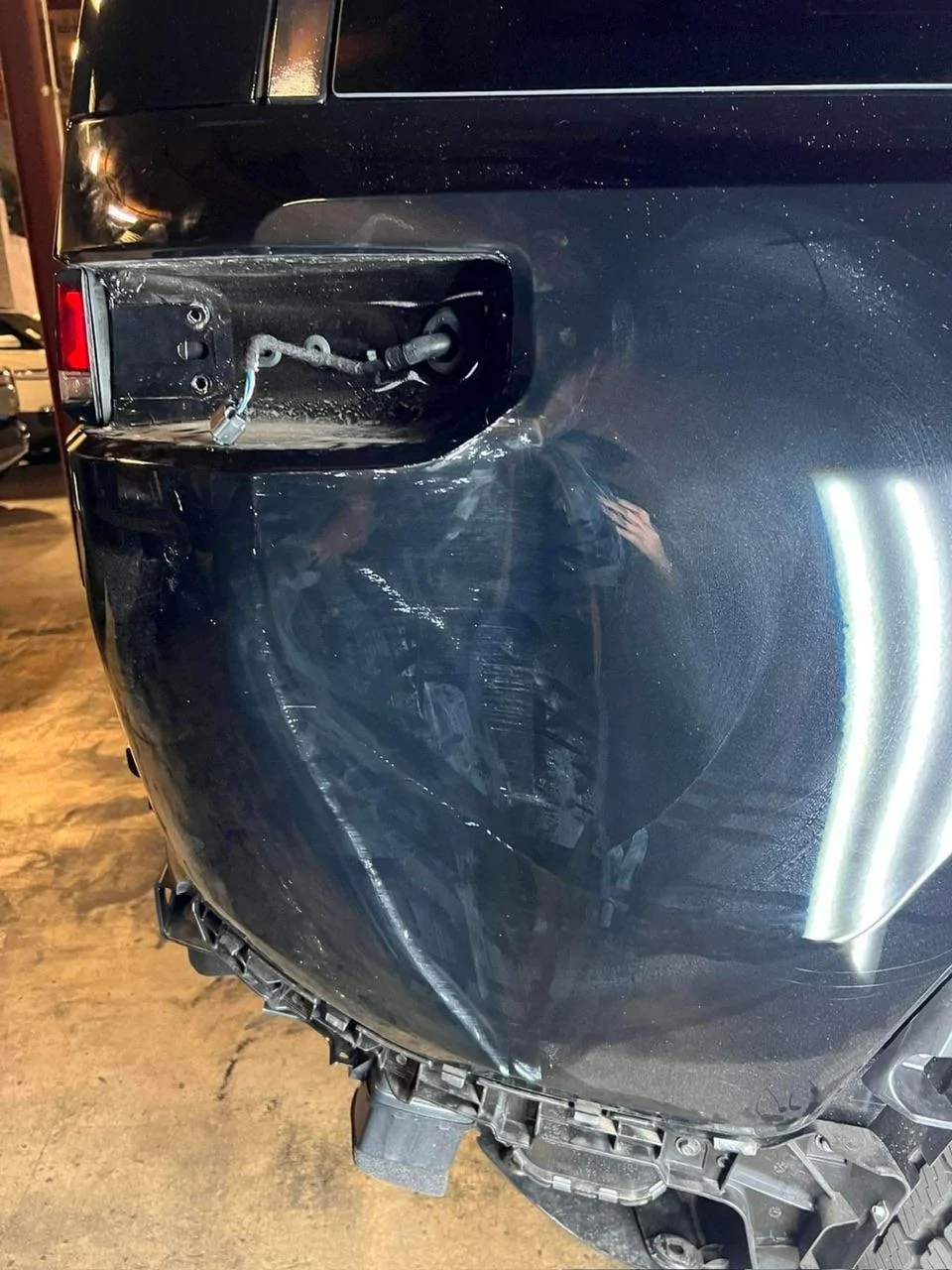Rivian R1T R1S Hit by an EDV while sitting at the service center IMG_1028