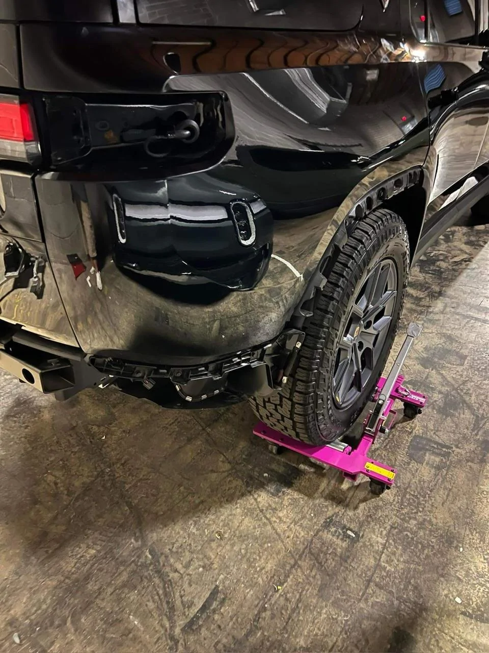 Rivian R1T R1S Hit by an EDV while sitting at the service center IMG_1029